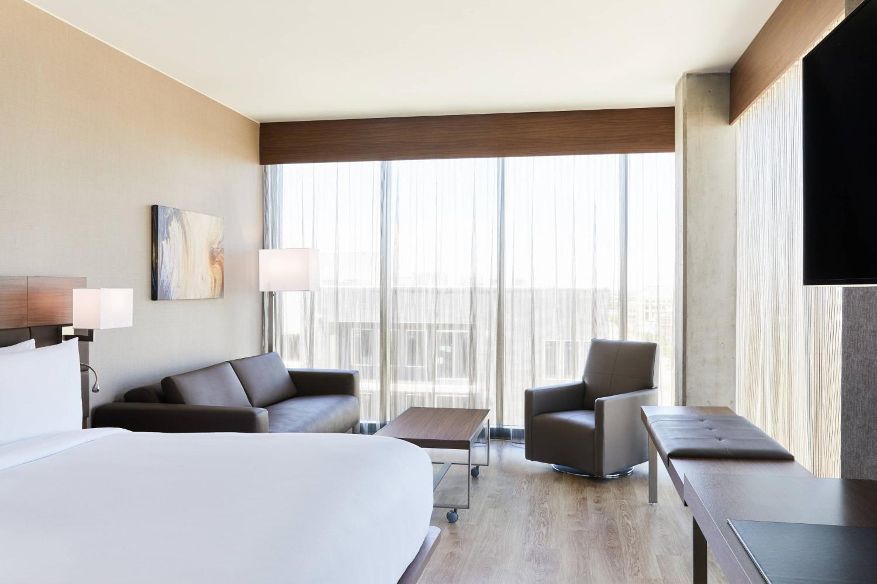 Corner King Room with Sofa Bed and City View