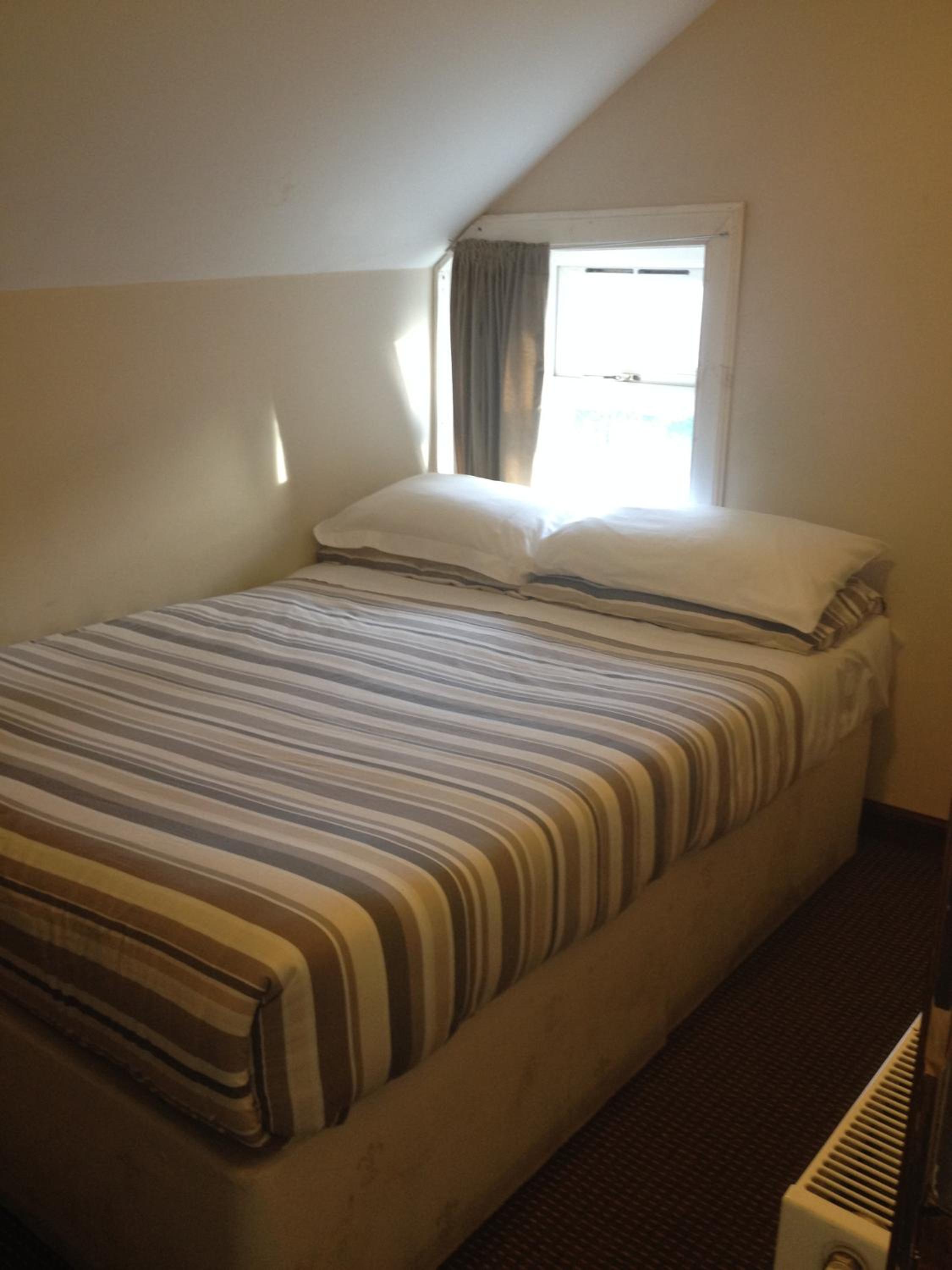 Basic Double Room with External Bathroom — the supplier's photographs — photo 4