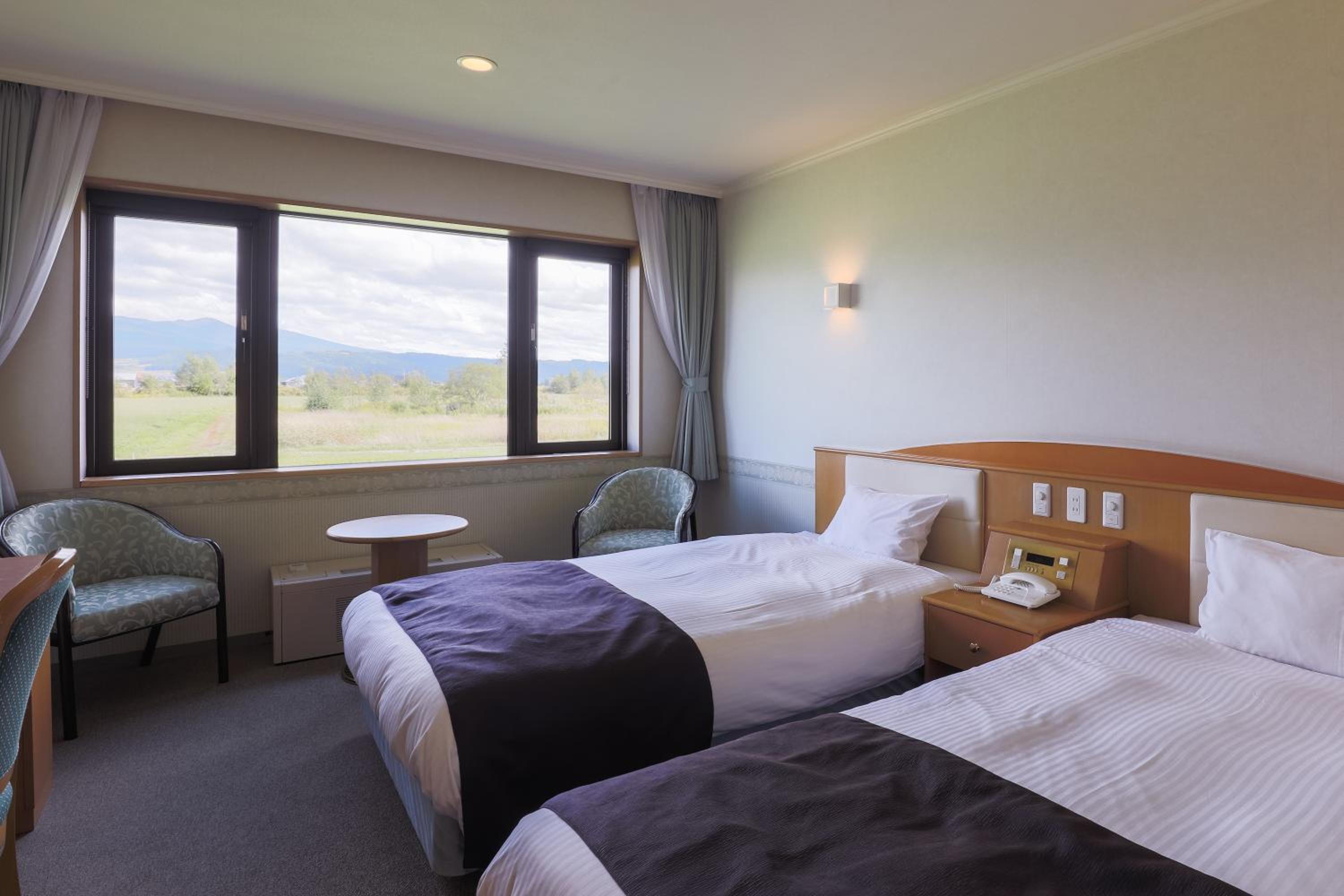 Twin Room - Photo 1