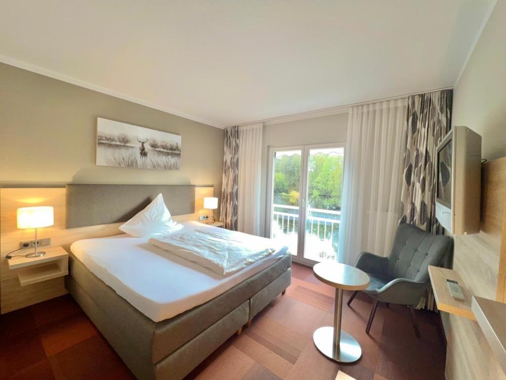 Double Room with Lake View - Photo 1