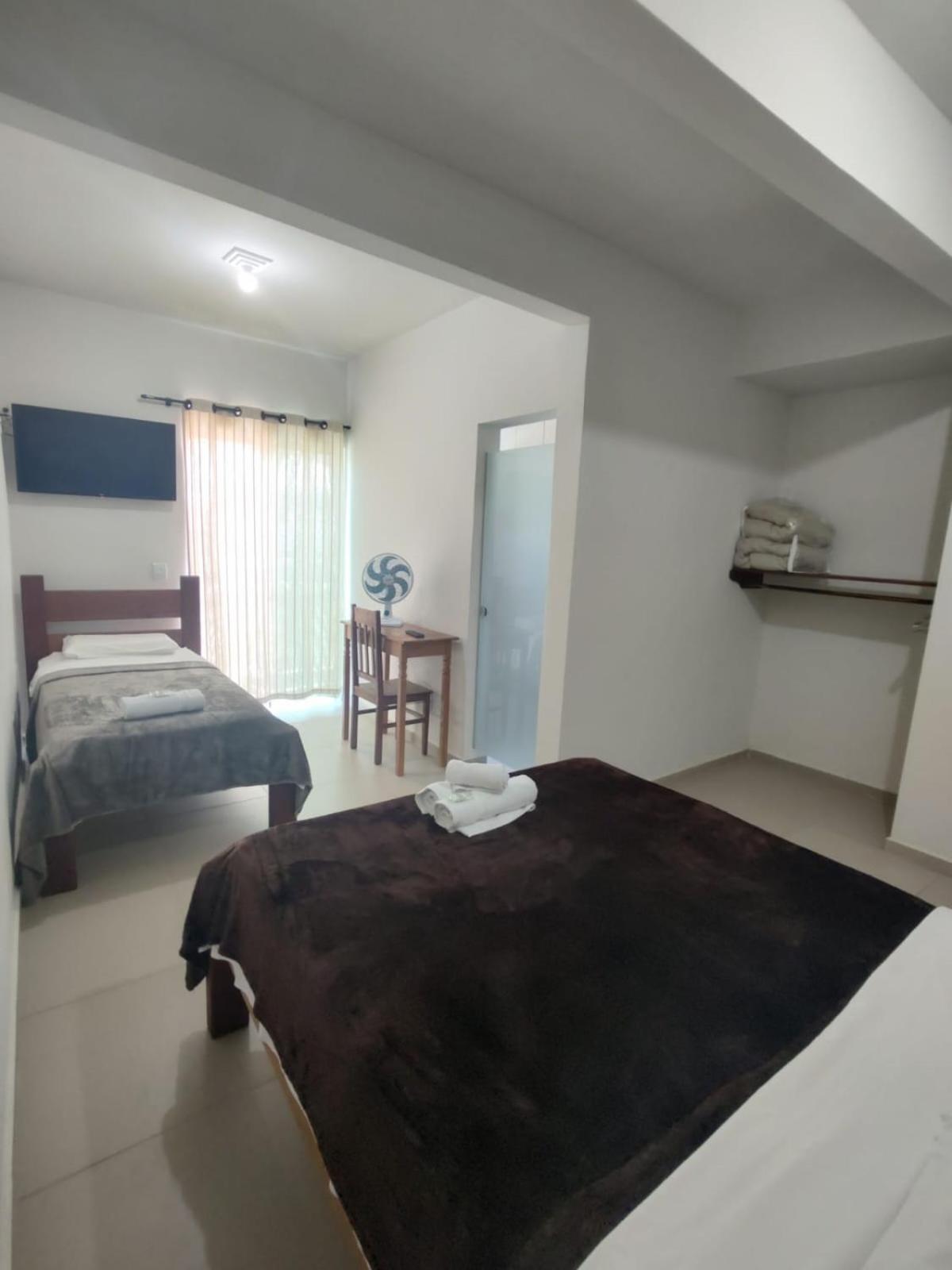 Deluxe Triple Room - Photo 11