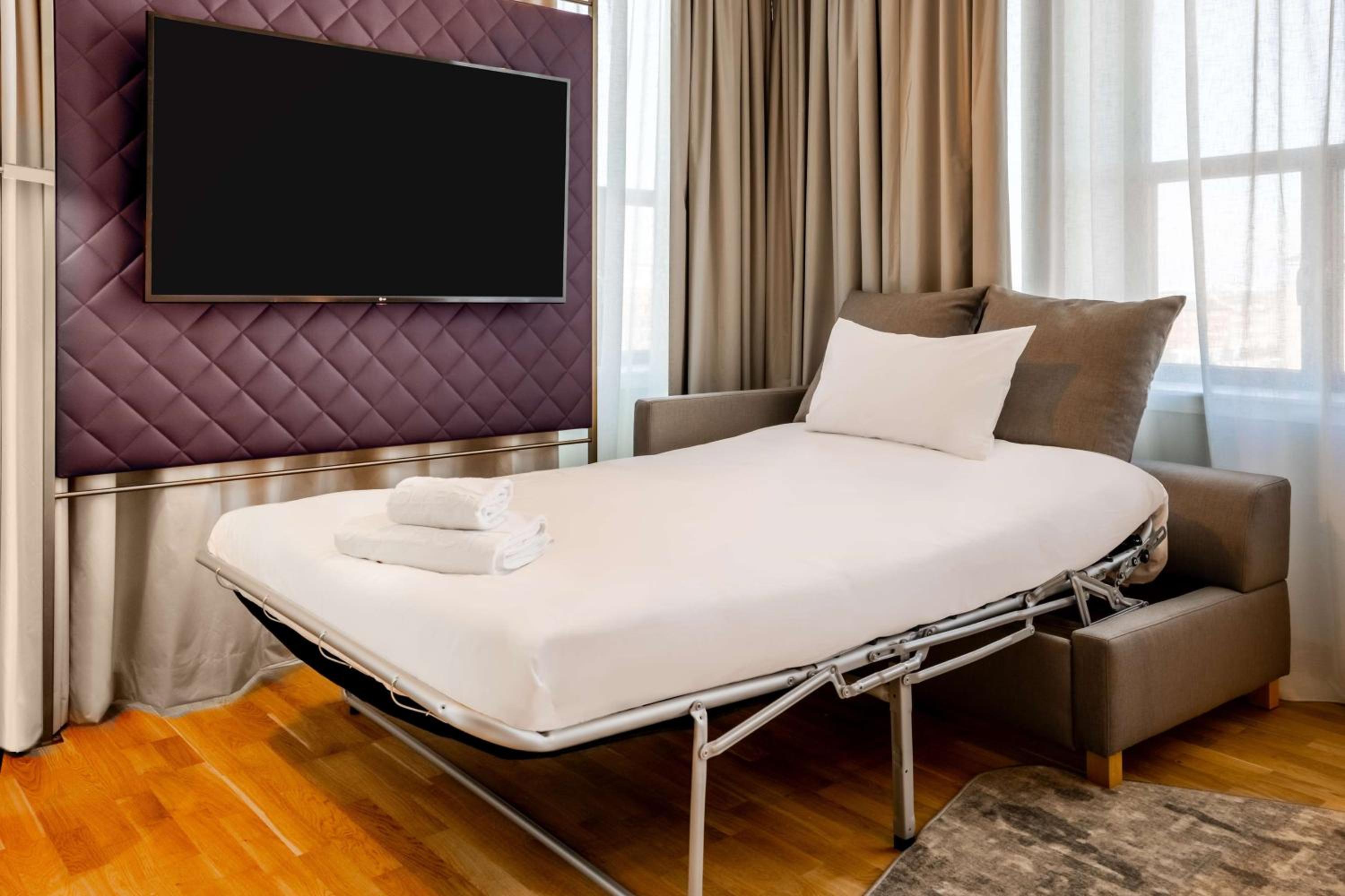 Premium Waterfront View Room with Extra Bed (2 Adults + 1 Child)
