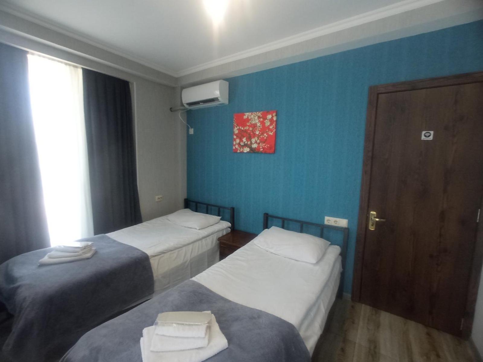 Twin Room with Private Bathroom
