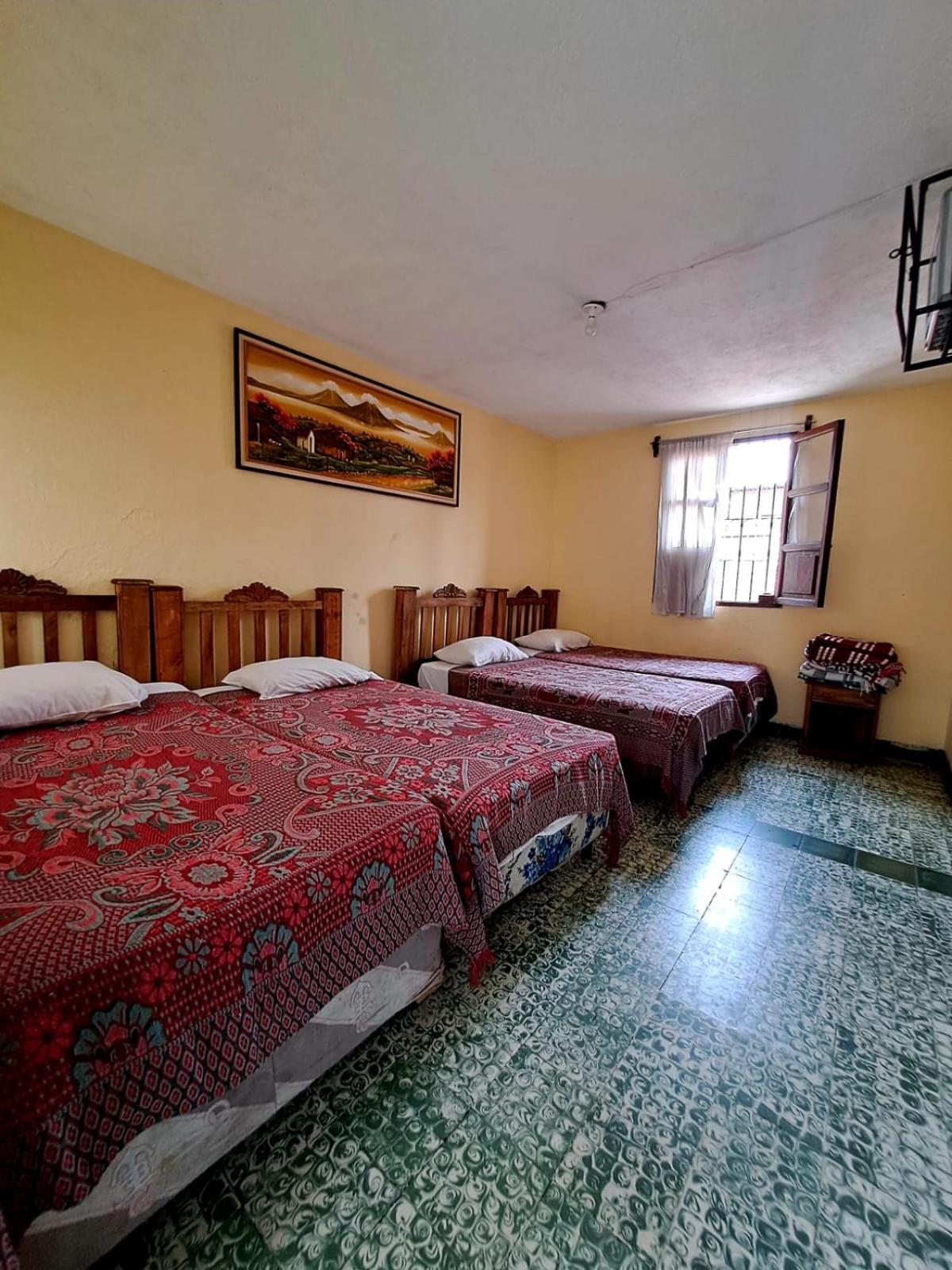 Quadruple Room with Private Bathroom