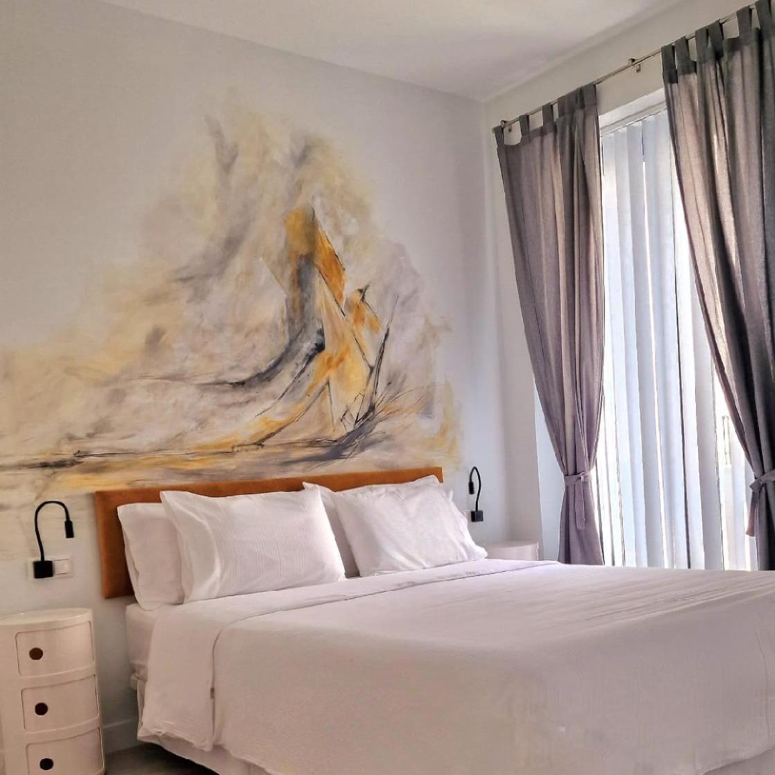 Habitación Doble con Balcón (2 adultos + 1 niño)
