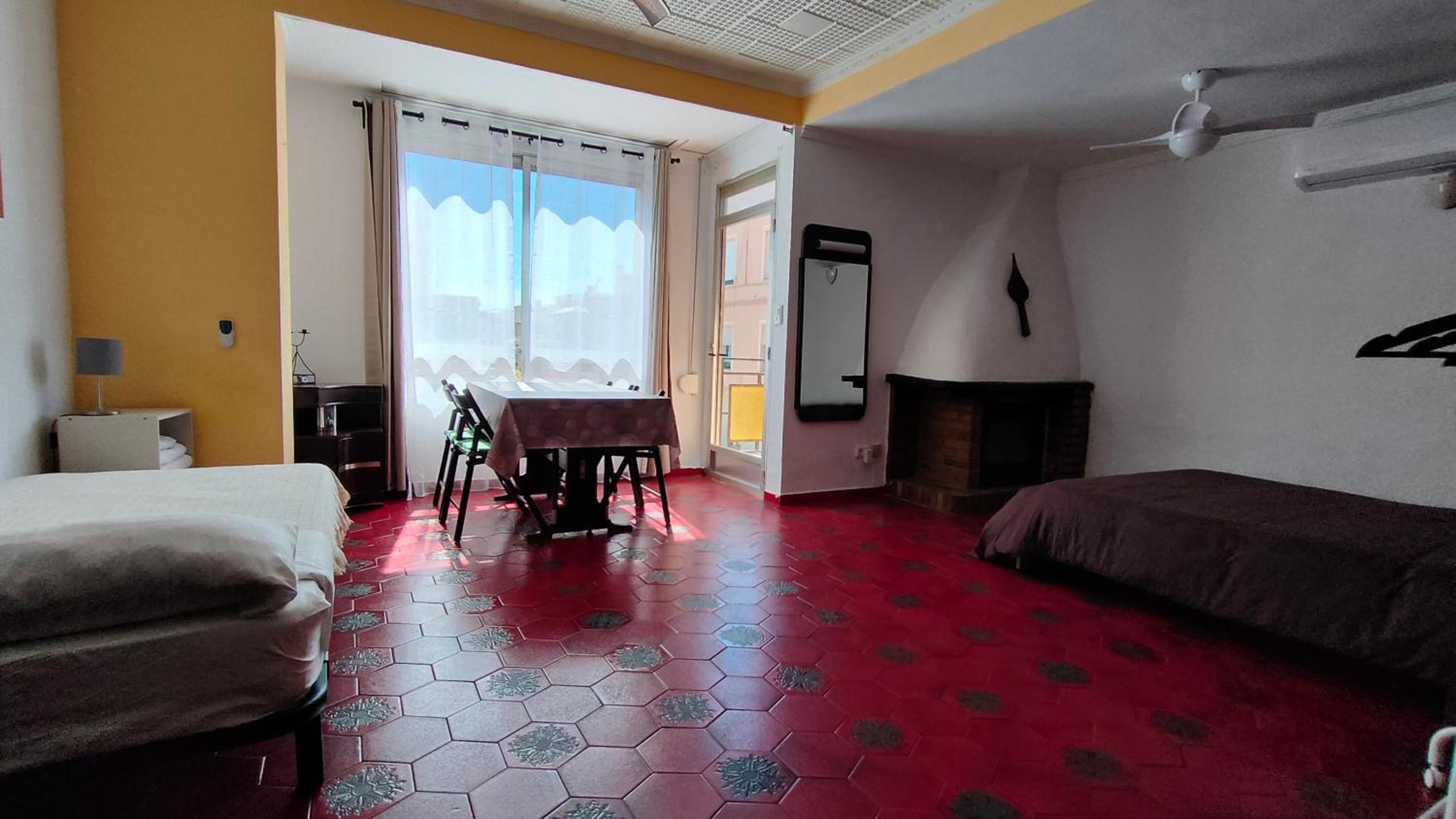 Habitación Triple con Balcón