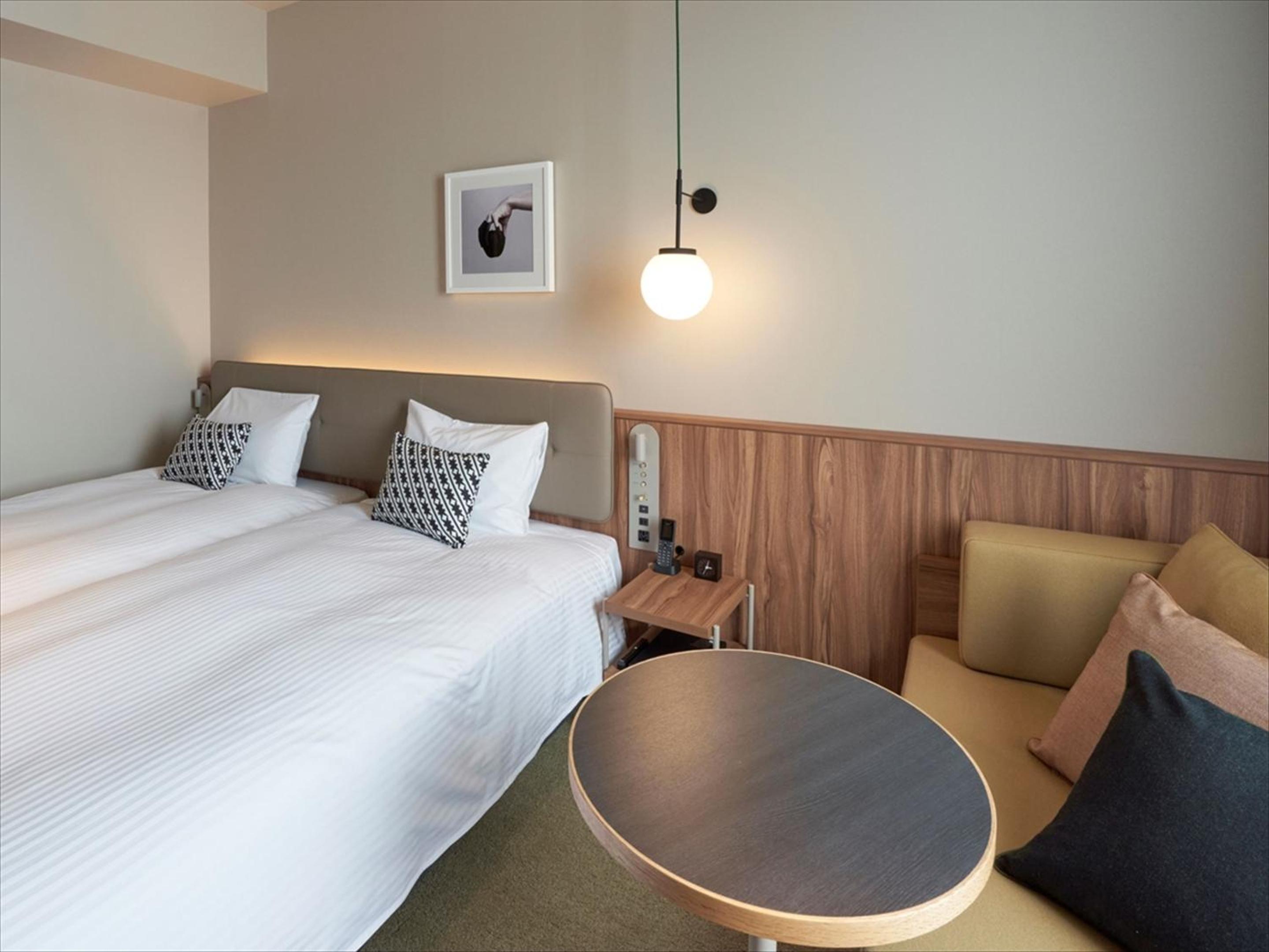 Comfort Twin Room with Sofa - Photo 12