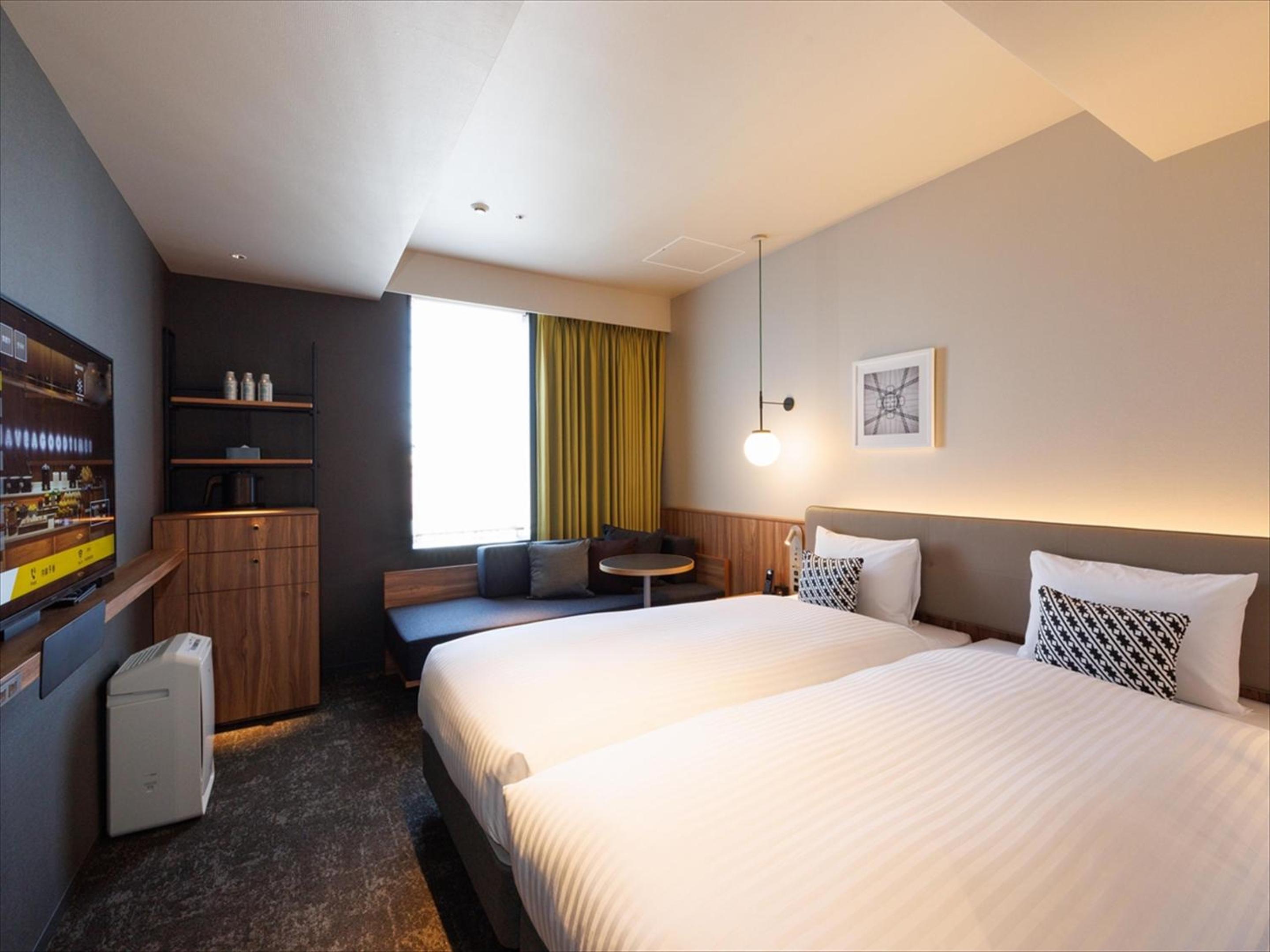Comfort Twin Room with Sofa - Photo 1