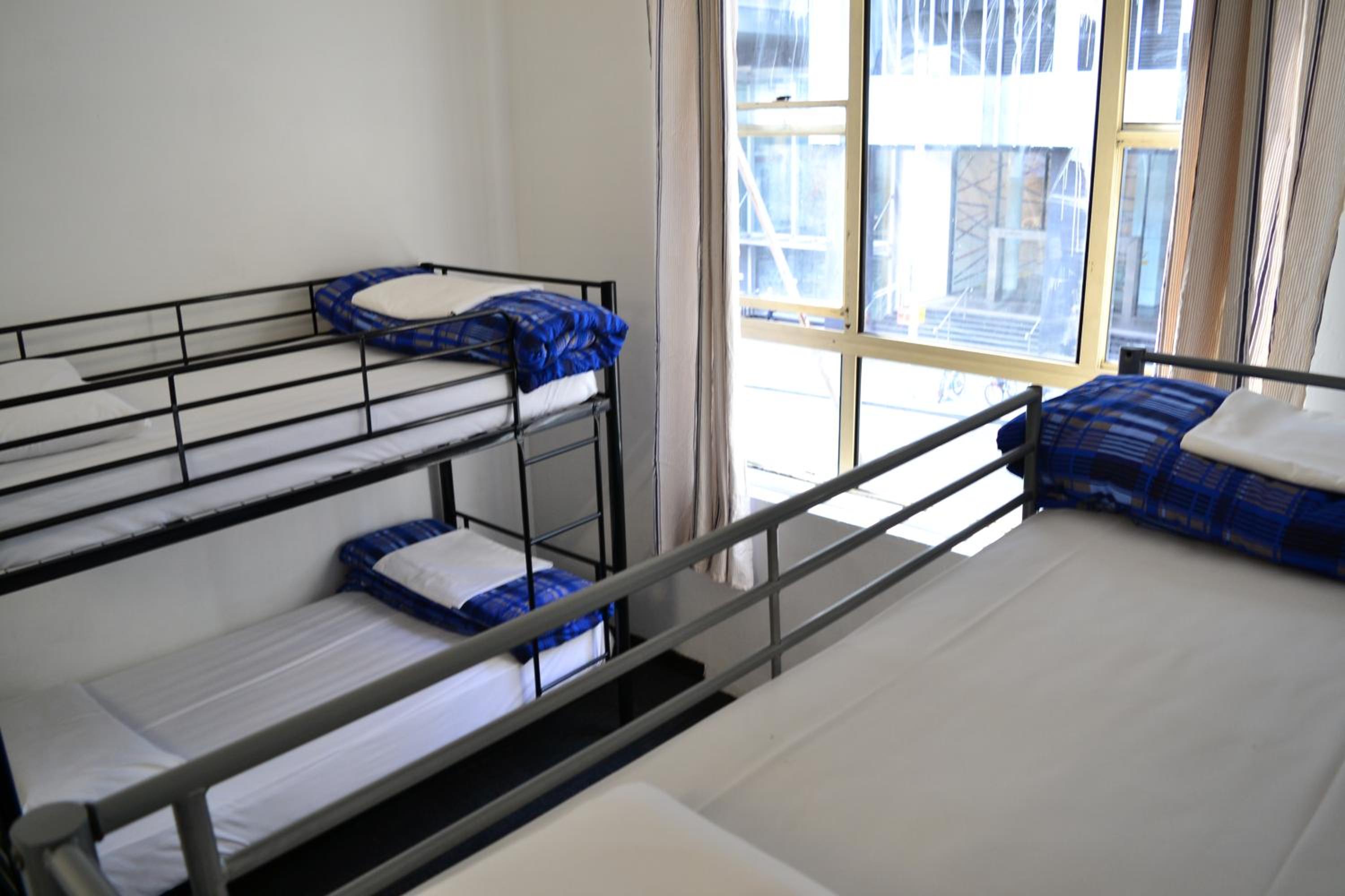 Bed in 4-Bed Female Dormitory Room with Shared Bathroom photo 3