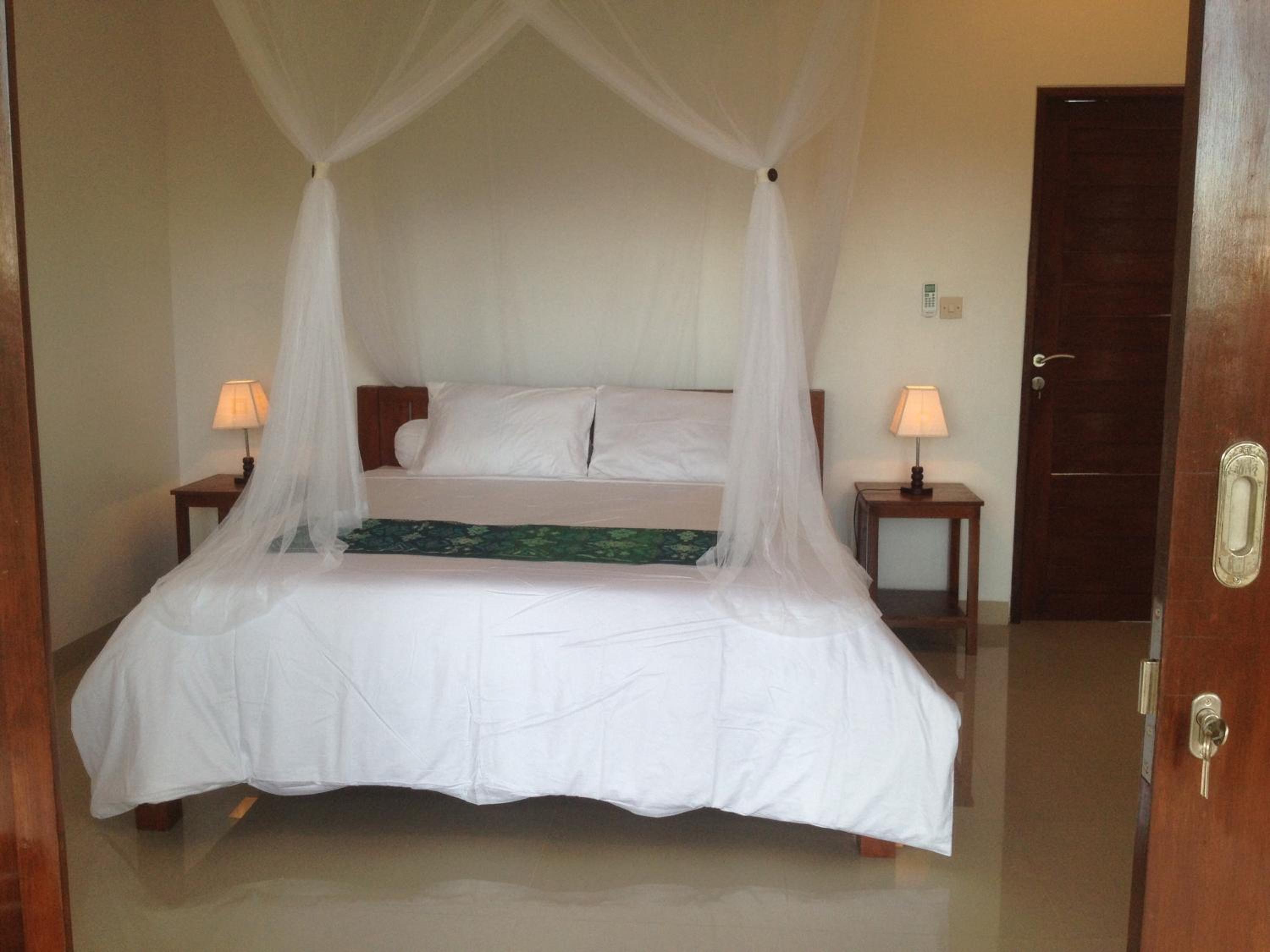 Deluxe Double Room with balcony and Garden View photo 3