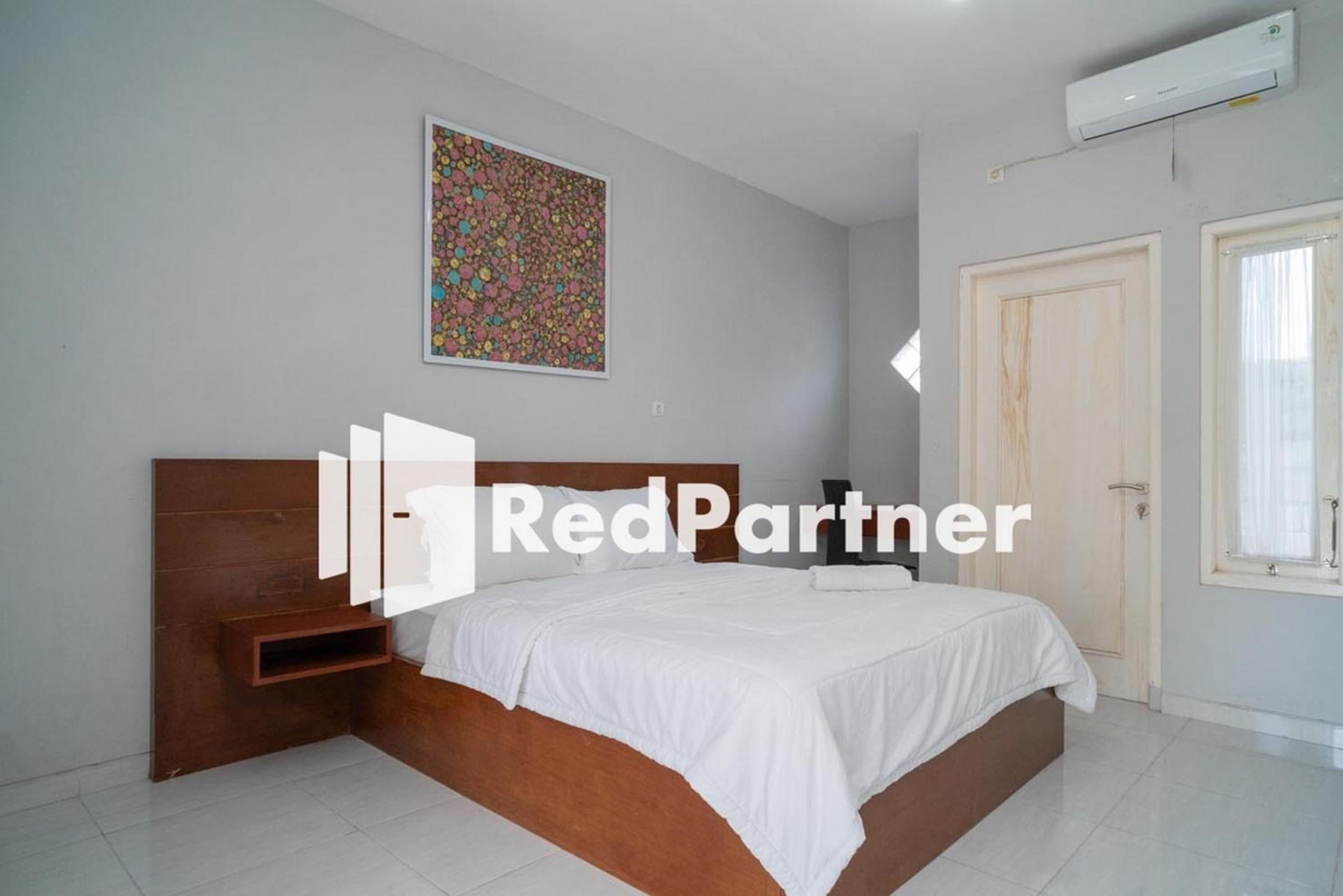 Deluxe Room - Photo 11