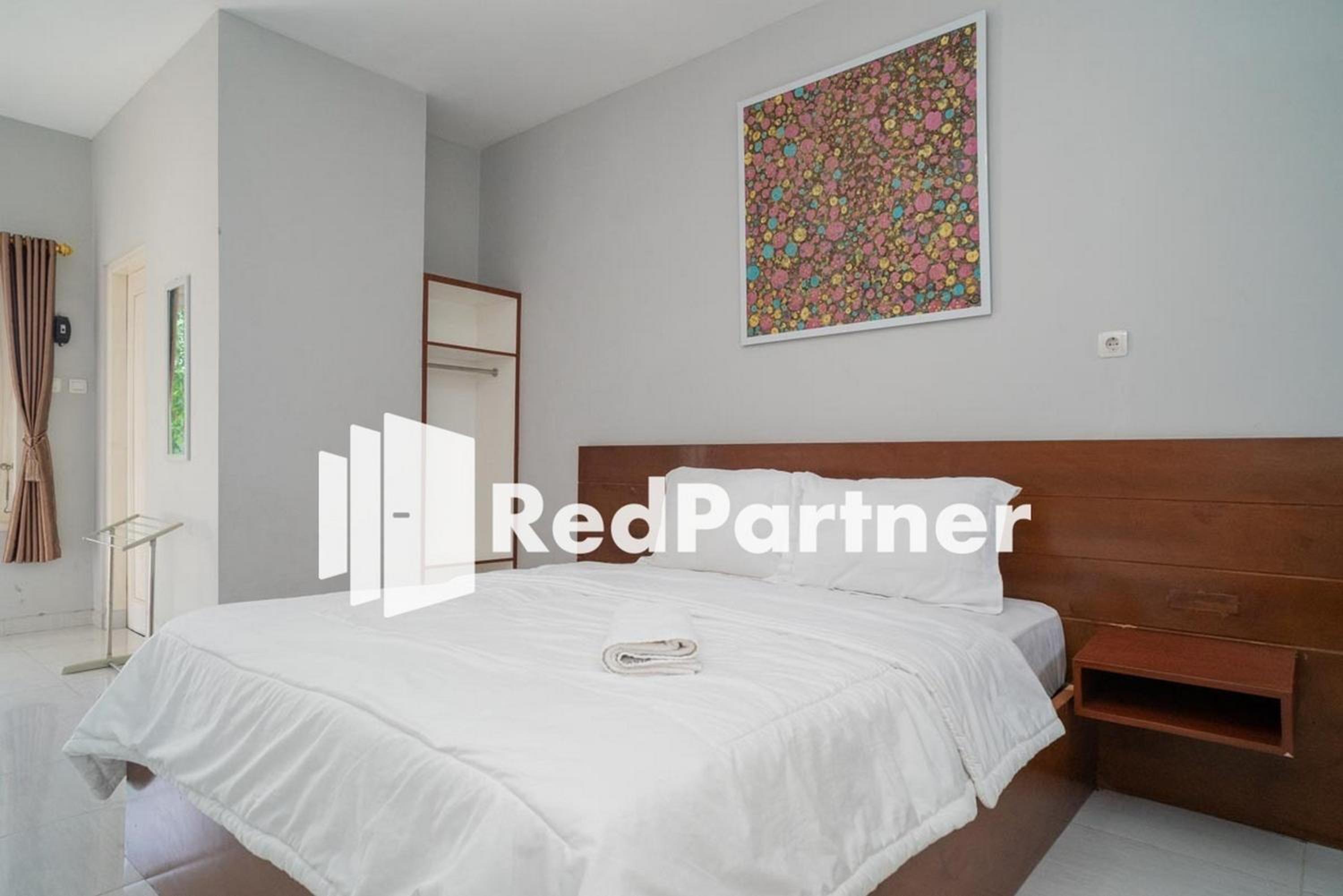 Deluxe Room - Photo 8