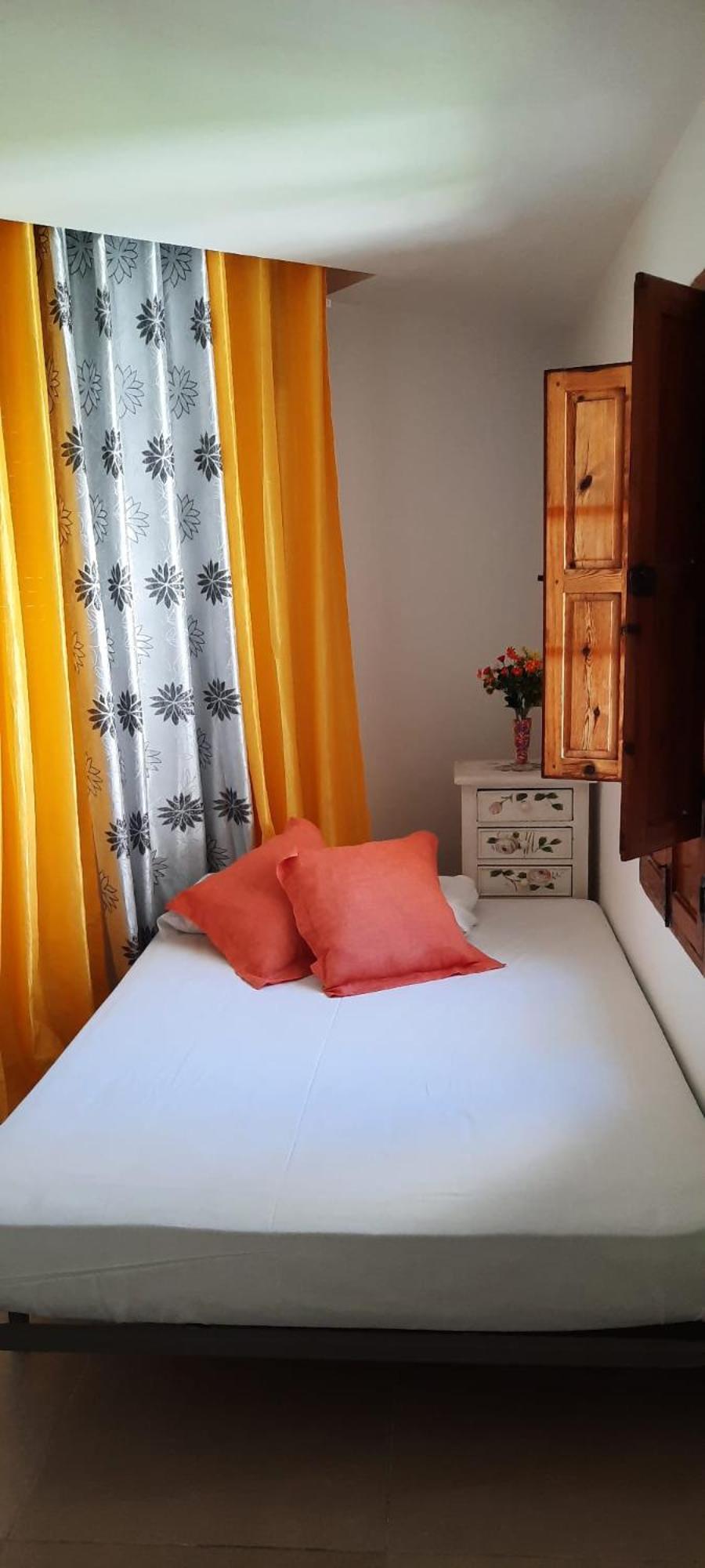 Habitación Queen con Baño Compartido