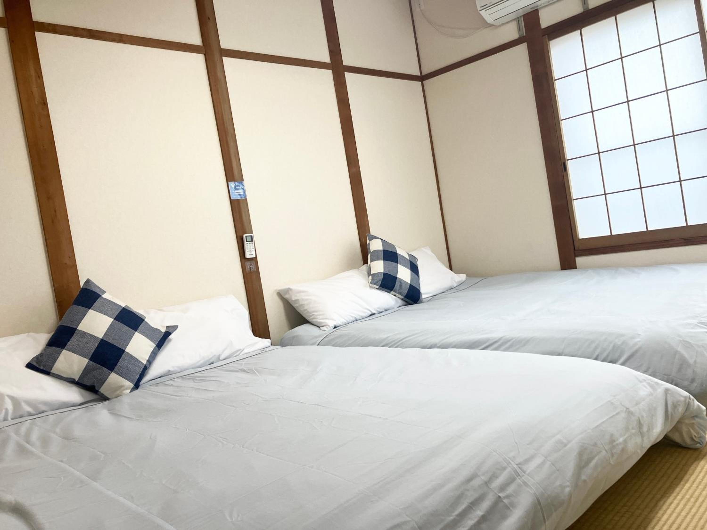 Quadruple Room with Shared Bathroom