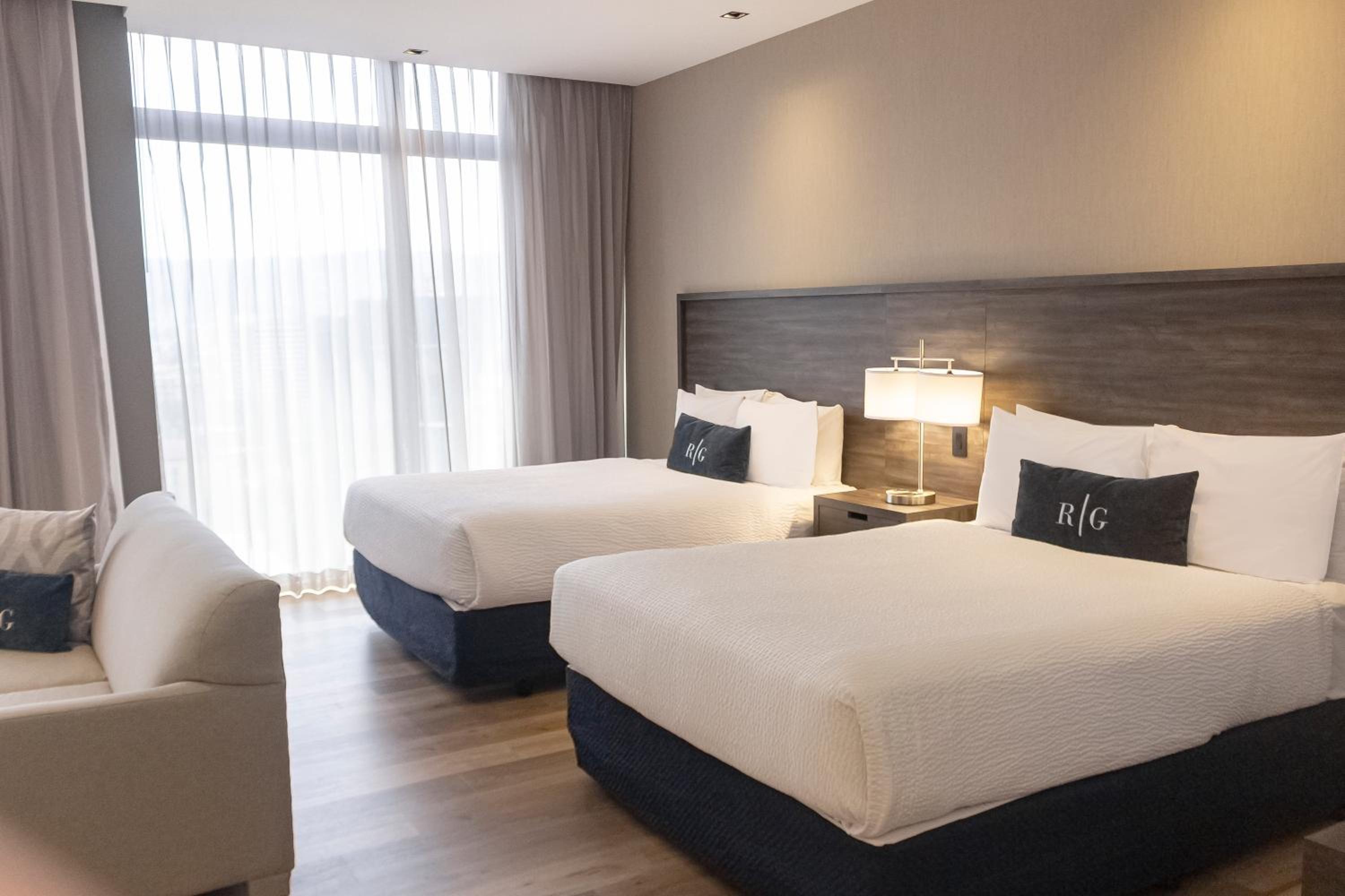 Queen Room with Two Queen Beds and Balcony, Non-Smoking photo 2