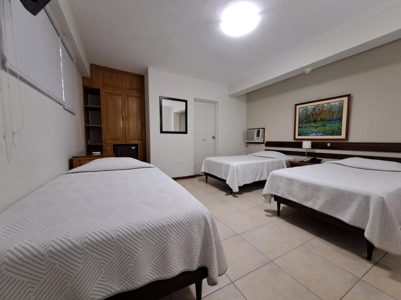 Triple Room - Photo 1
