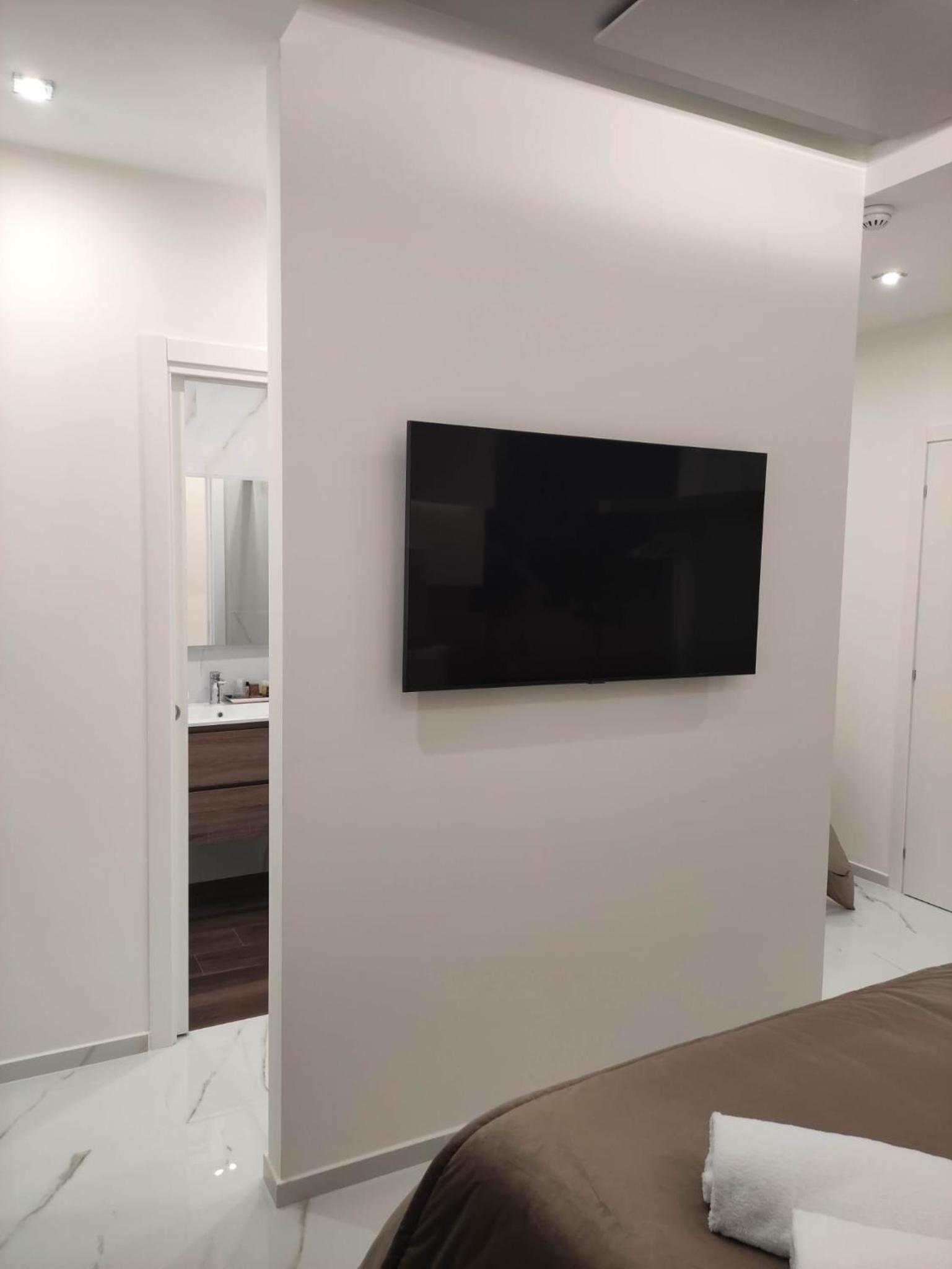 Deluxe Triple Room - Photo 11
