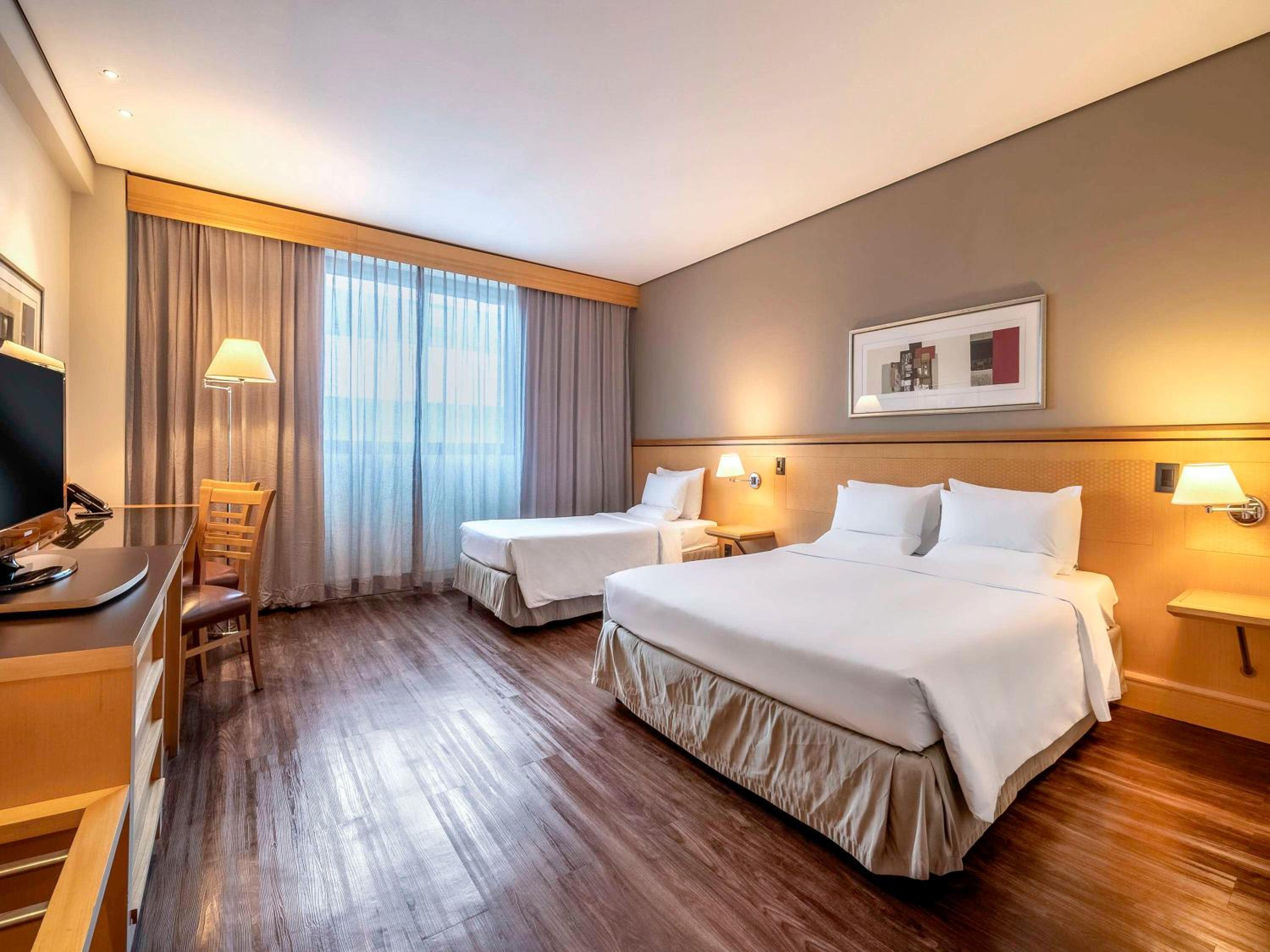 Standard Room with One Double Bed and One Single Bed - Photo 1