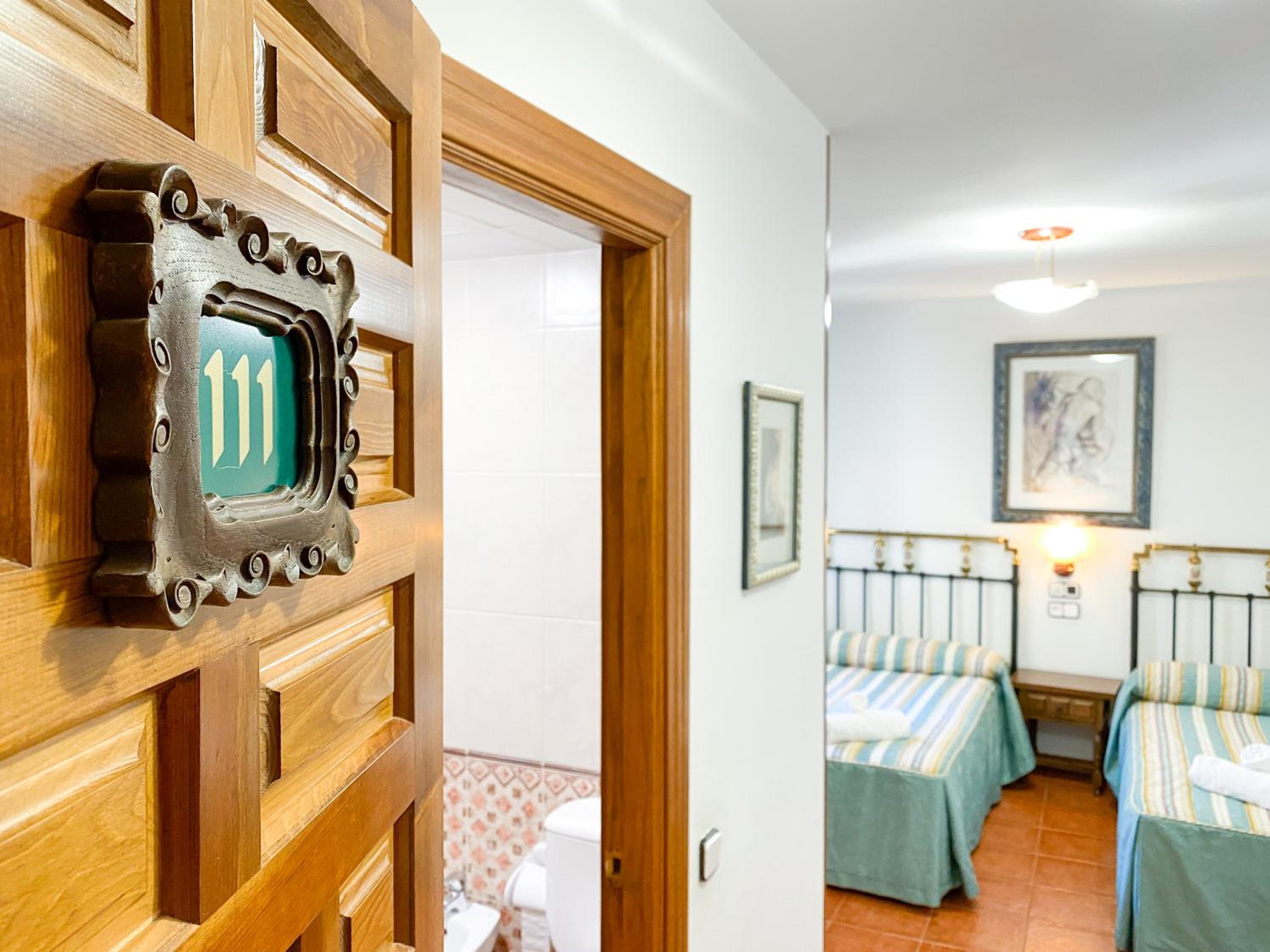 Habitación Queen con Dos Camas Queen
