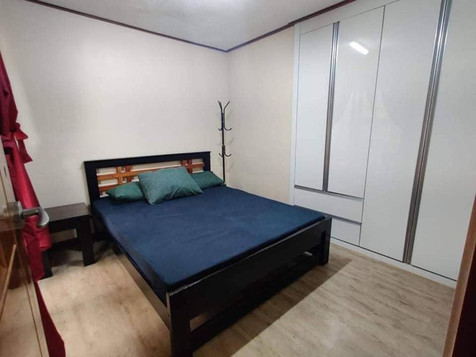 Two-Bedroom Apartment - Photo 13