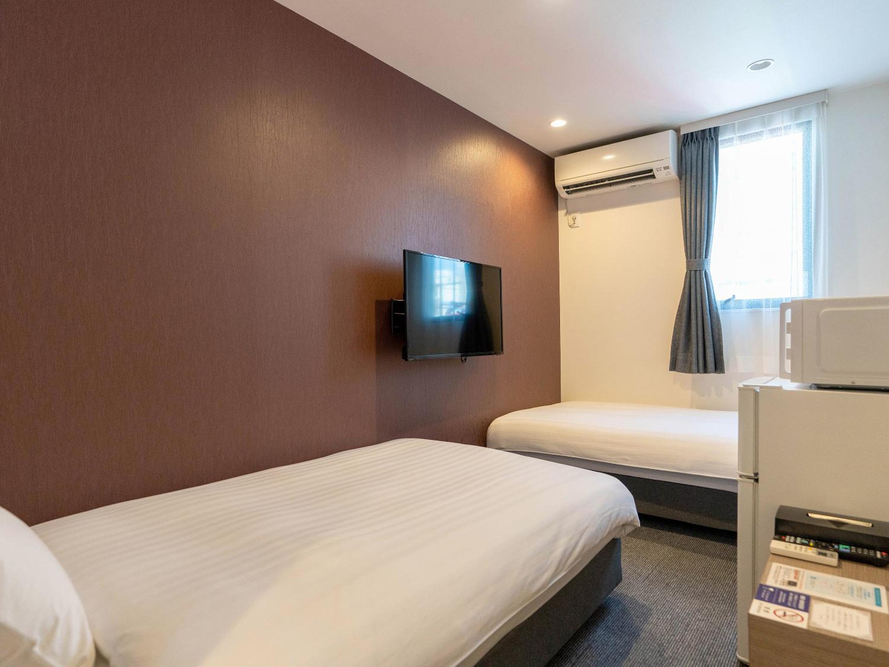 Standard Twin Room - Photo 1