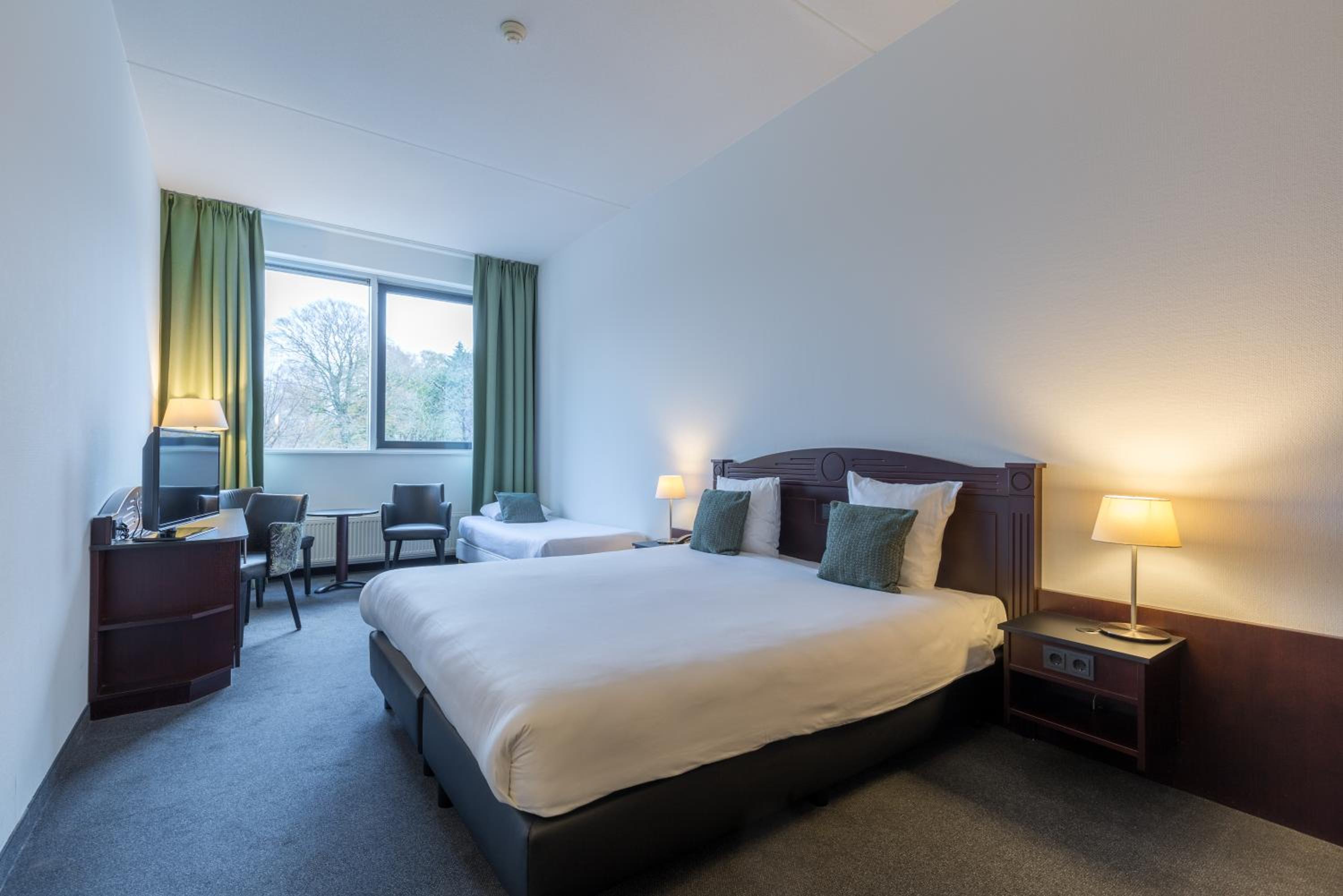 Deluxe Triple Room - Photo 1