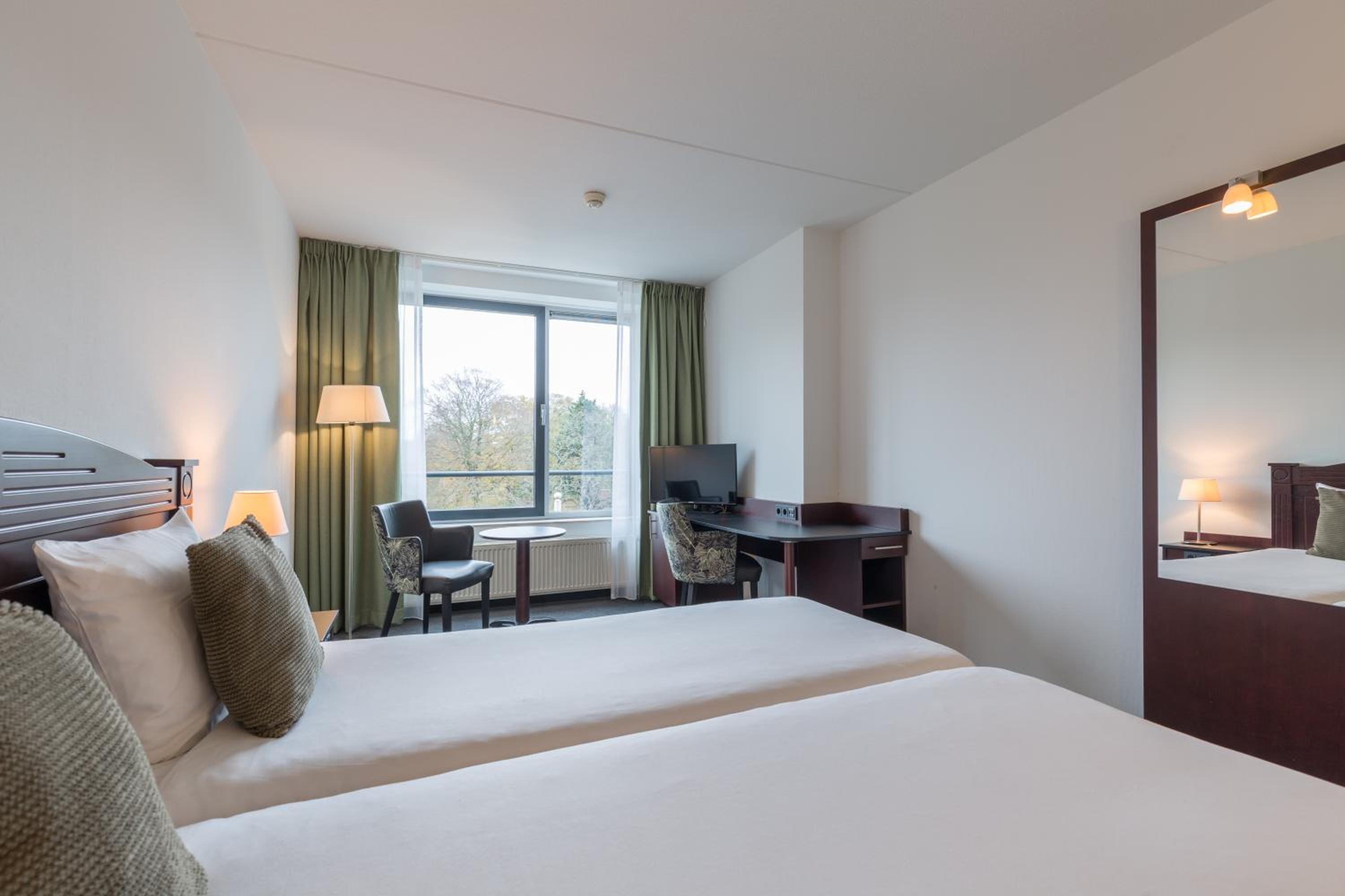 Deluxe Room - Photo 1