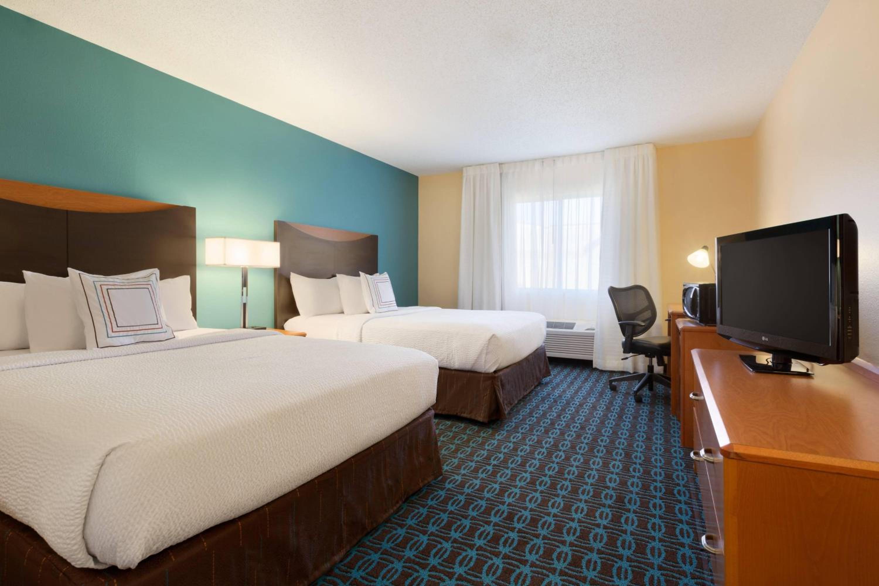 Queen Room with Two Queen Beds - Photo 1
