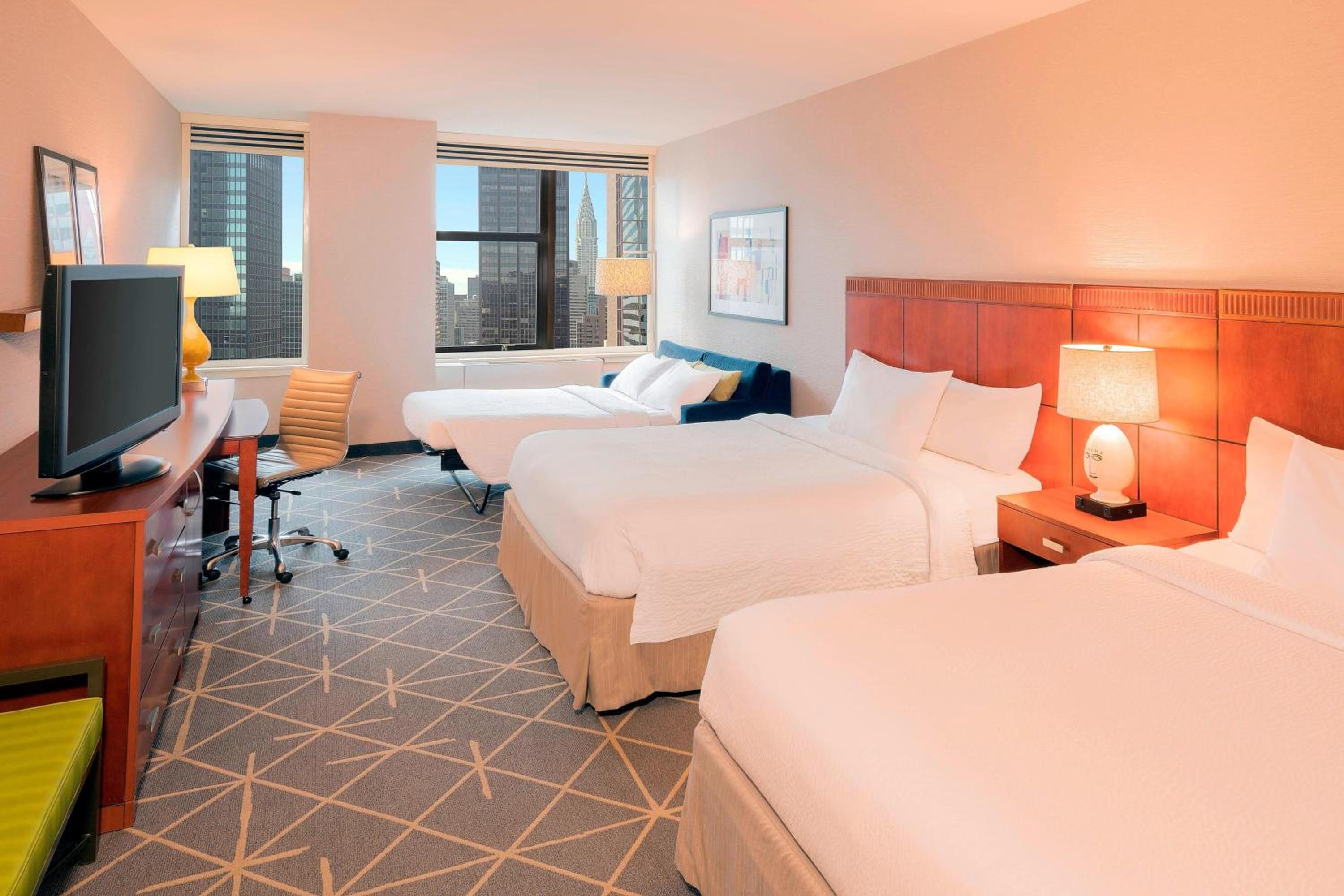 Queen Room with Two Queen Beds and Sofa Bed