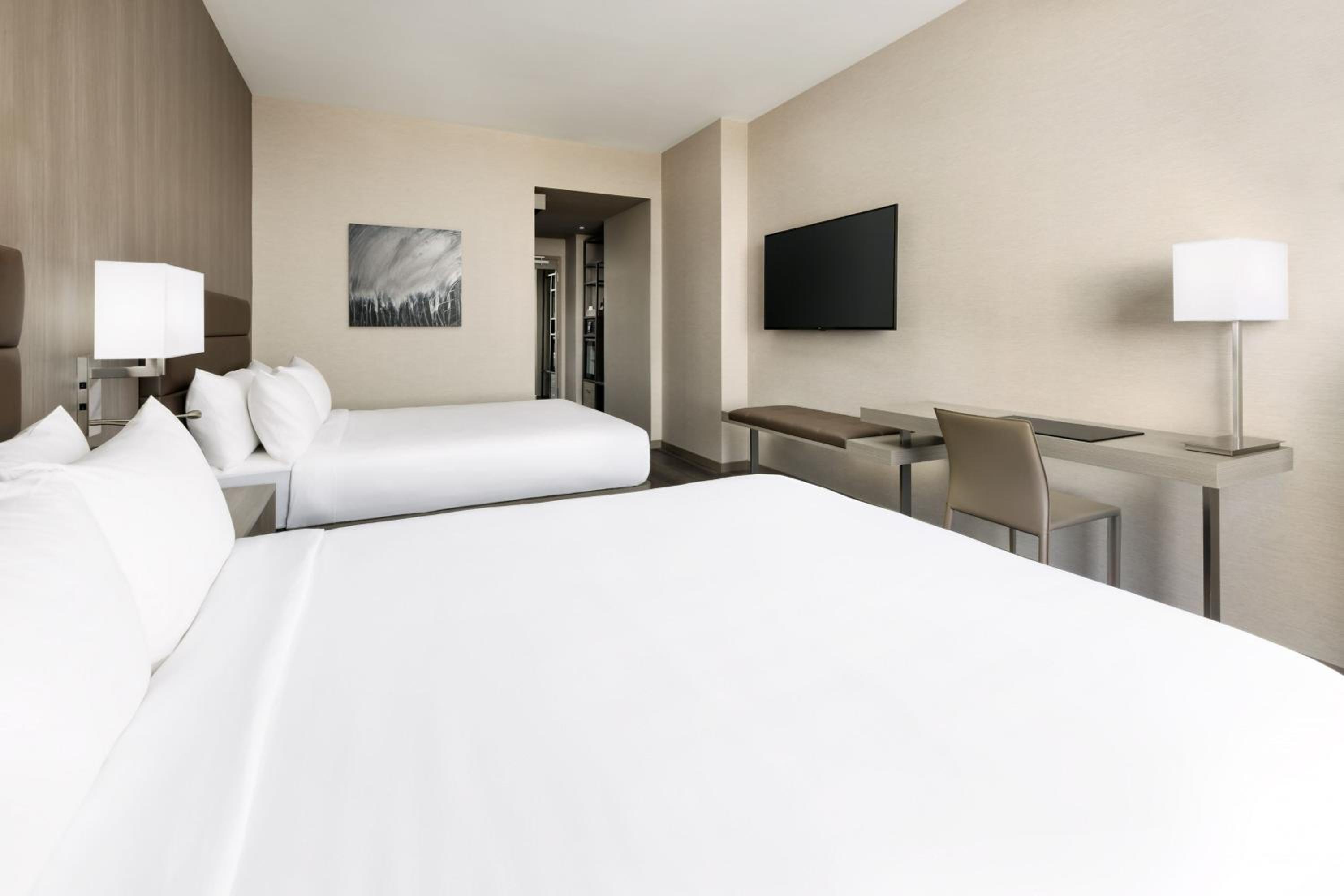 Standard Queen Room with Two Queen Beds - Photo 1