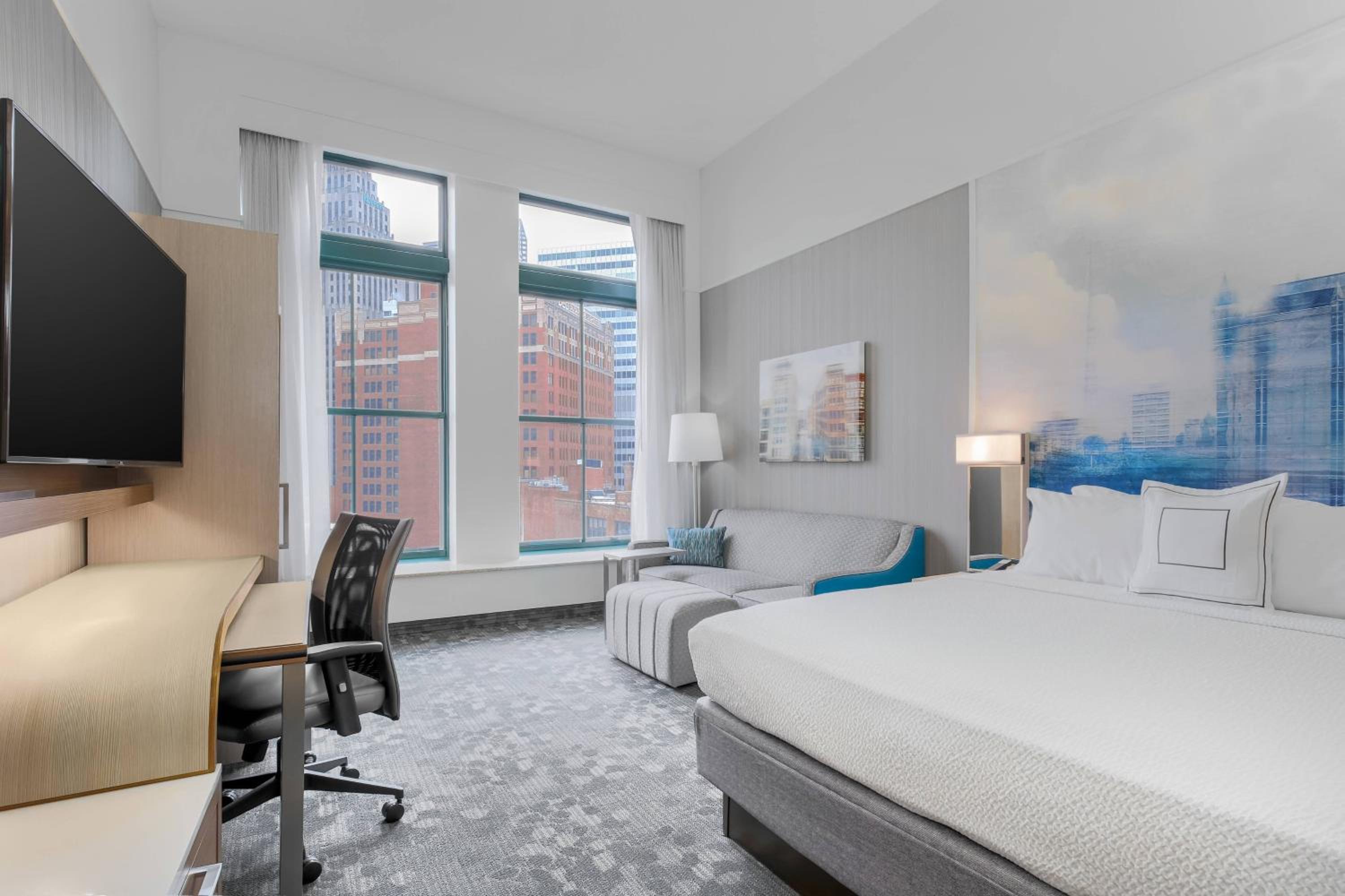 King Room with Sofa Bed and City View - Photo 1