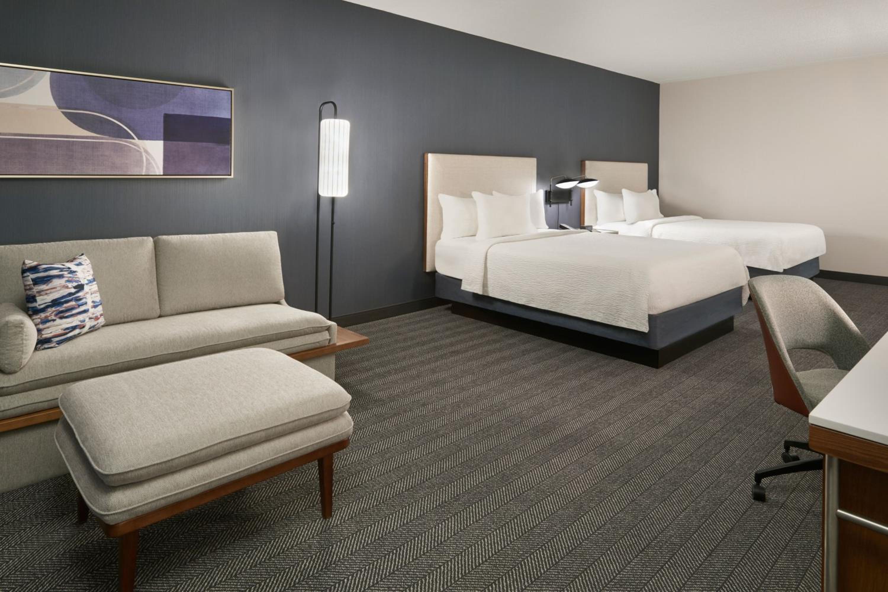 Queen Room with Two Queen Beds and Sofa Bed - Photo 1