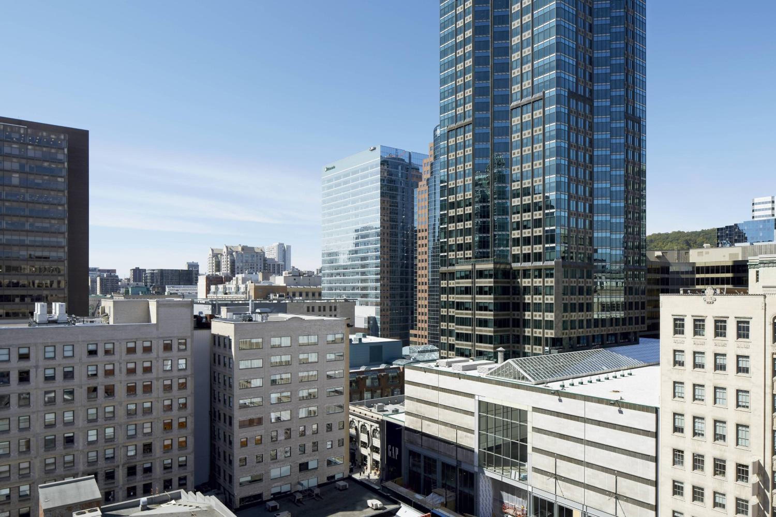One-Bedroom King Suite with Sofa Bed and Whirlpool - City View