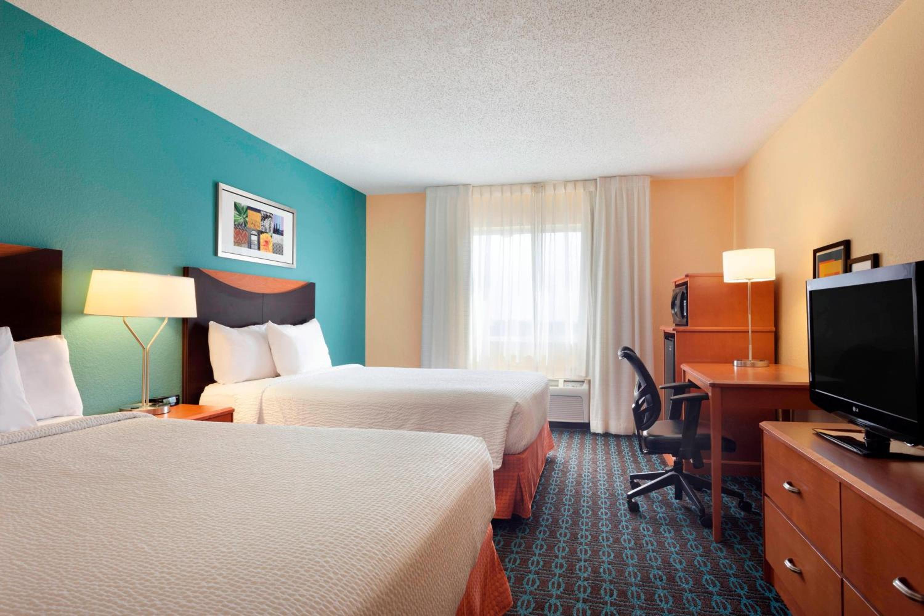 Queen Room with Two Queen Beds - Photo 1