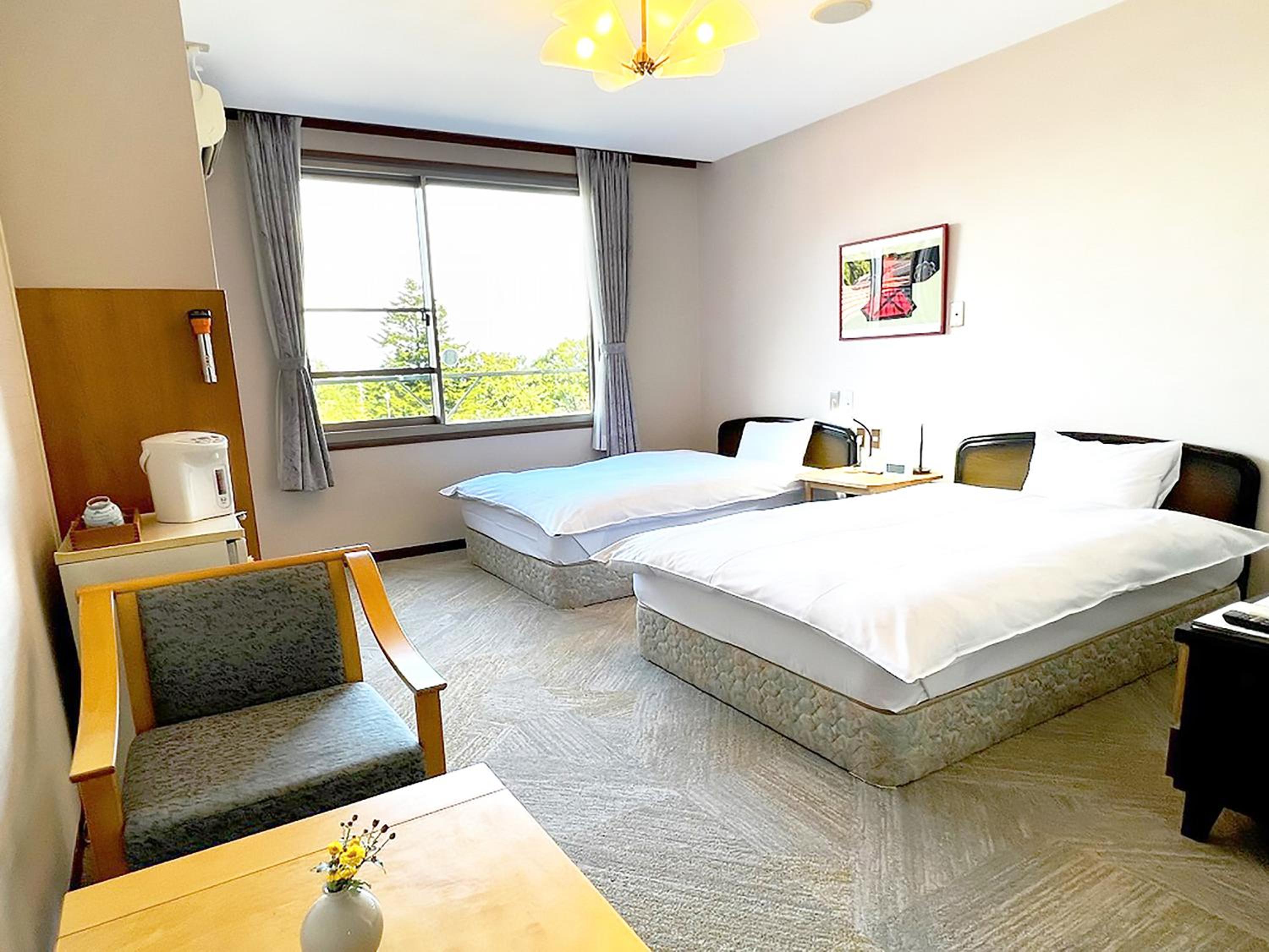 Standard Twin Room - Photo 1