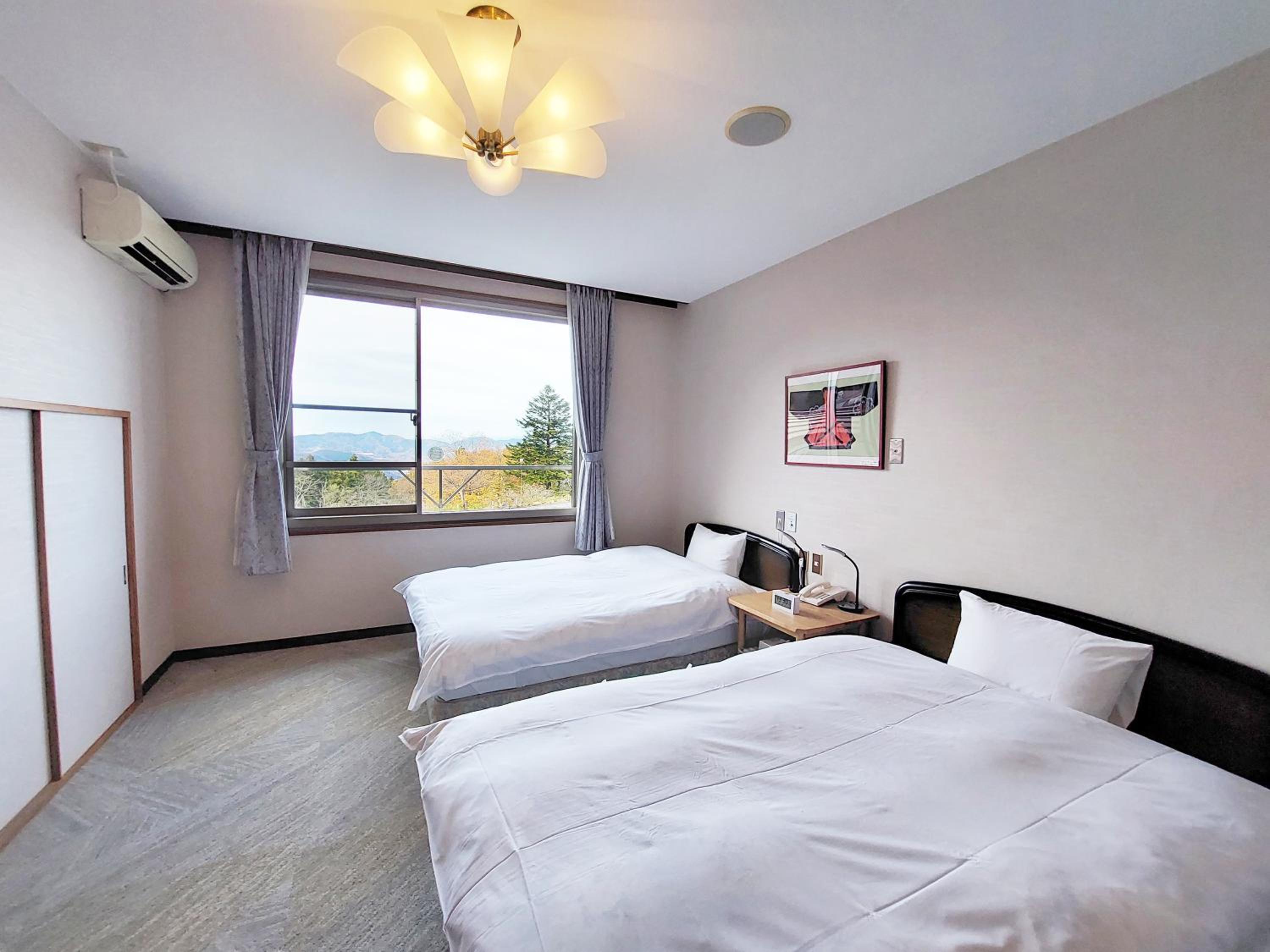 Standard Twin Room - Photo 3