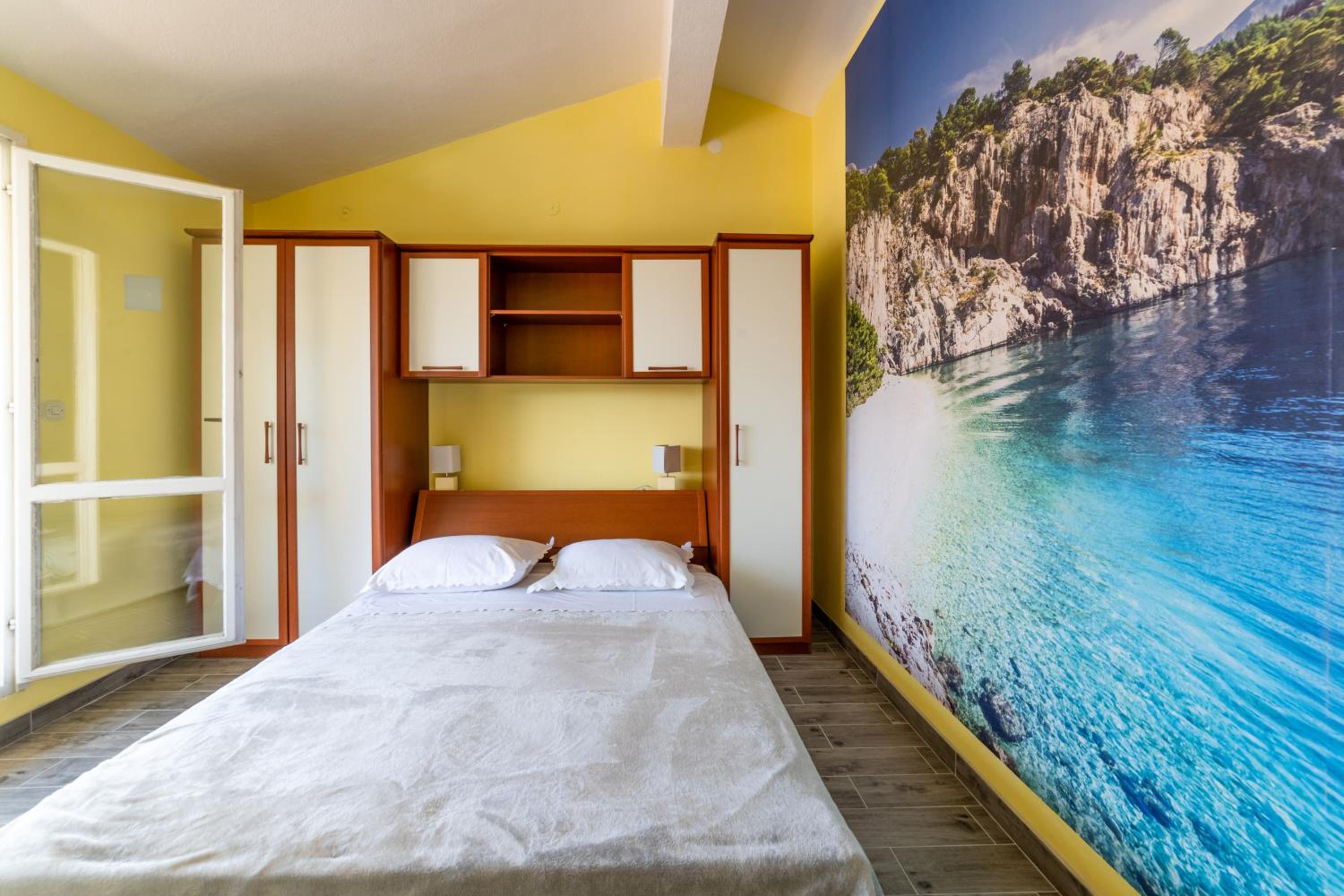 Three-Bedroom Apartment with Terrace and Sea View