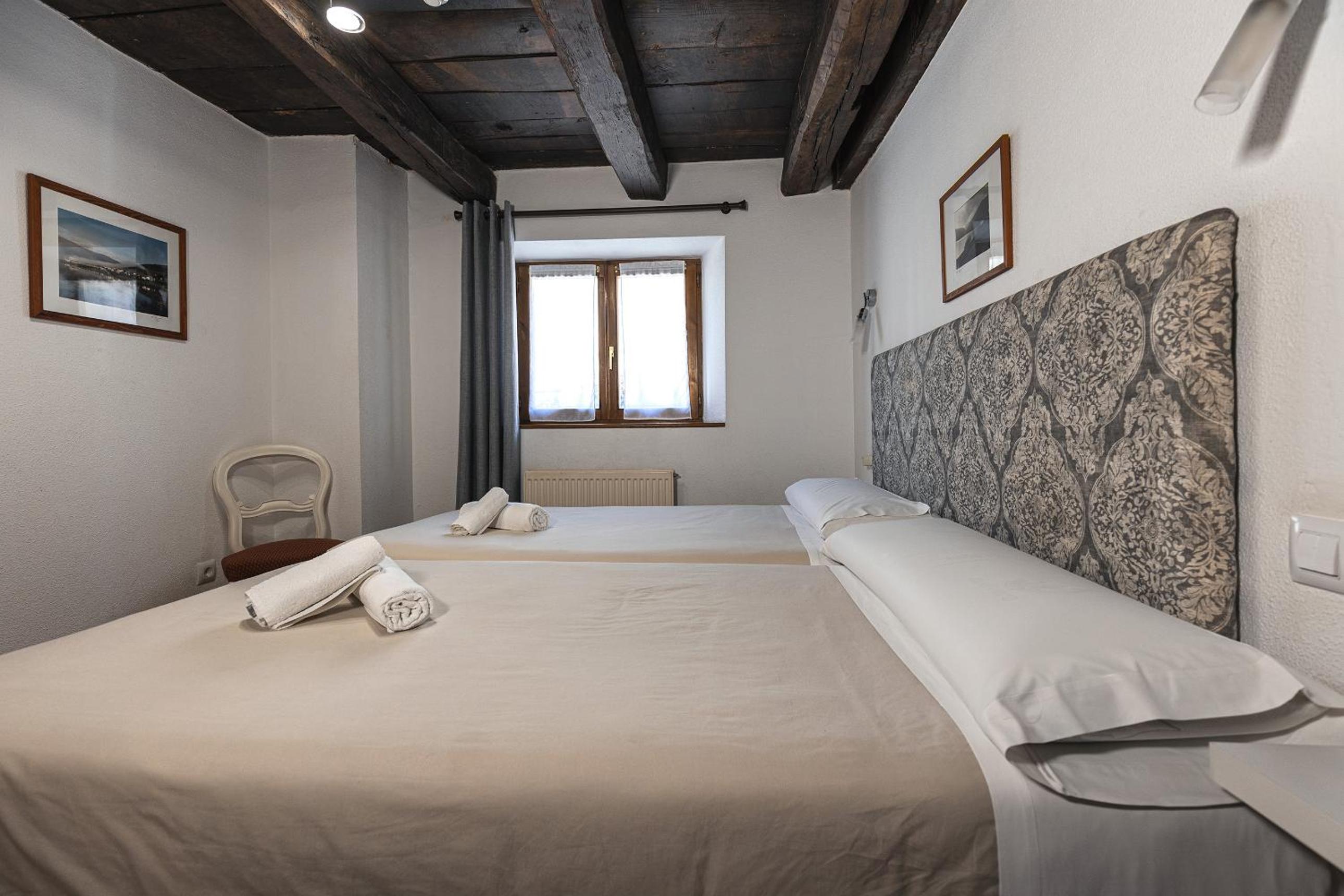 Habitación Doble con Dos Camas Dobles