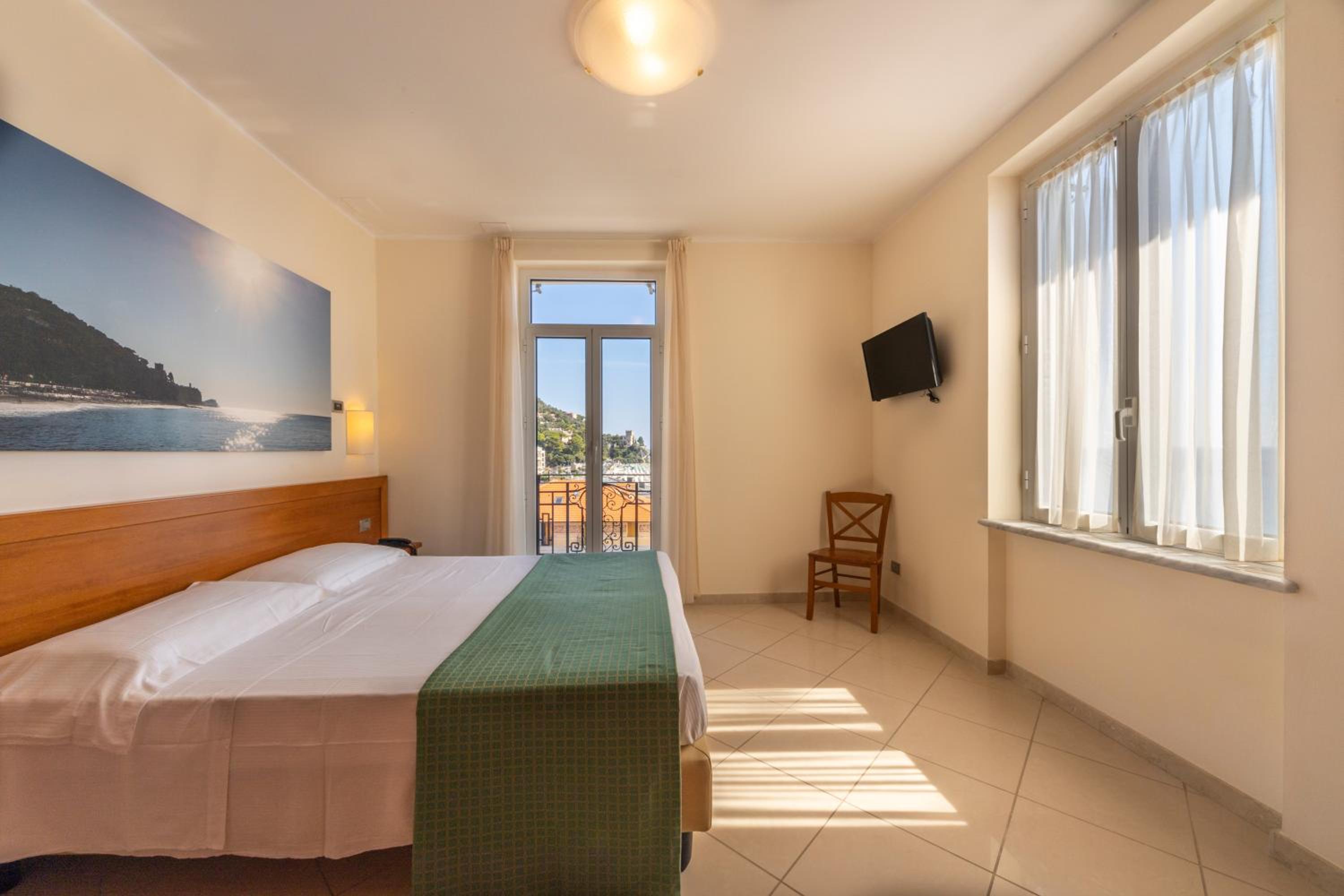 One-Bedroom Apartment with Balcony and Sea View