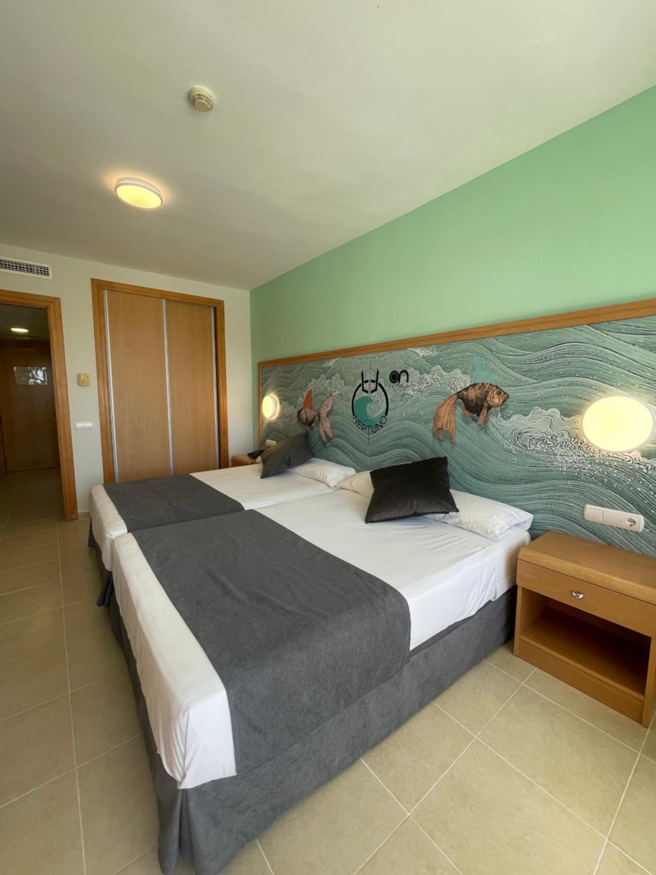 Twin Room (2 Adults + 1 Child)