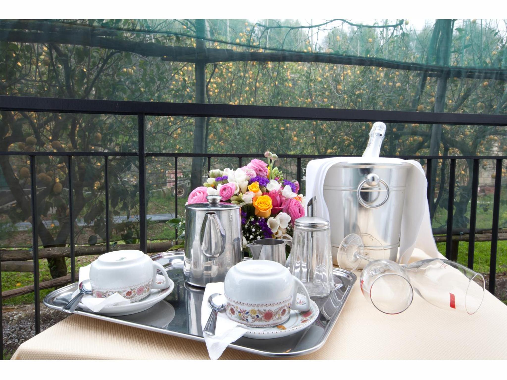 Triple Room with Balcony and Garden View photo 3