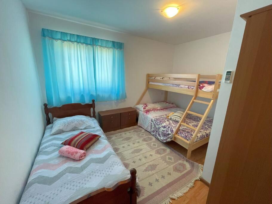 Three-Bedroom Apartment photo 1