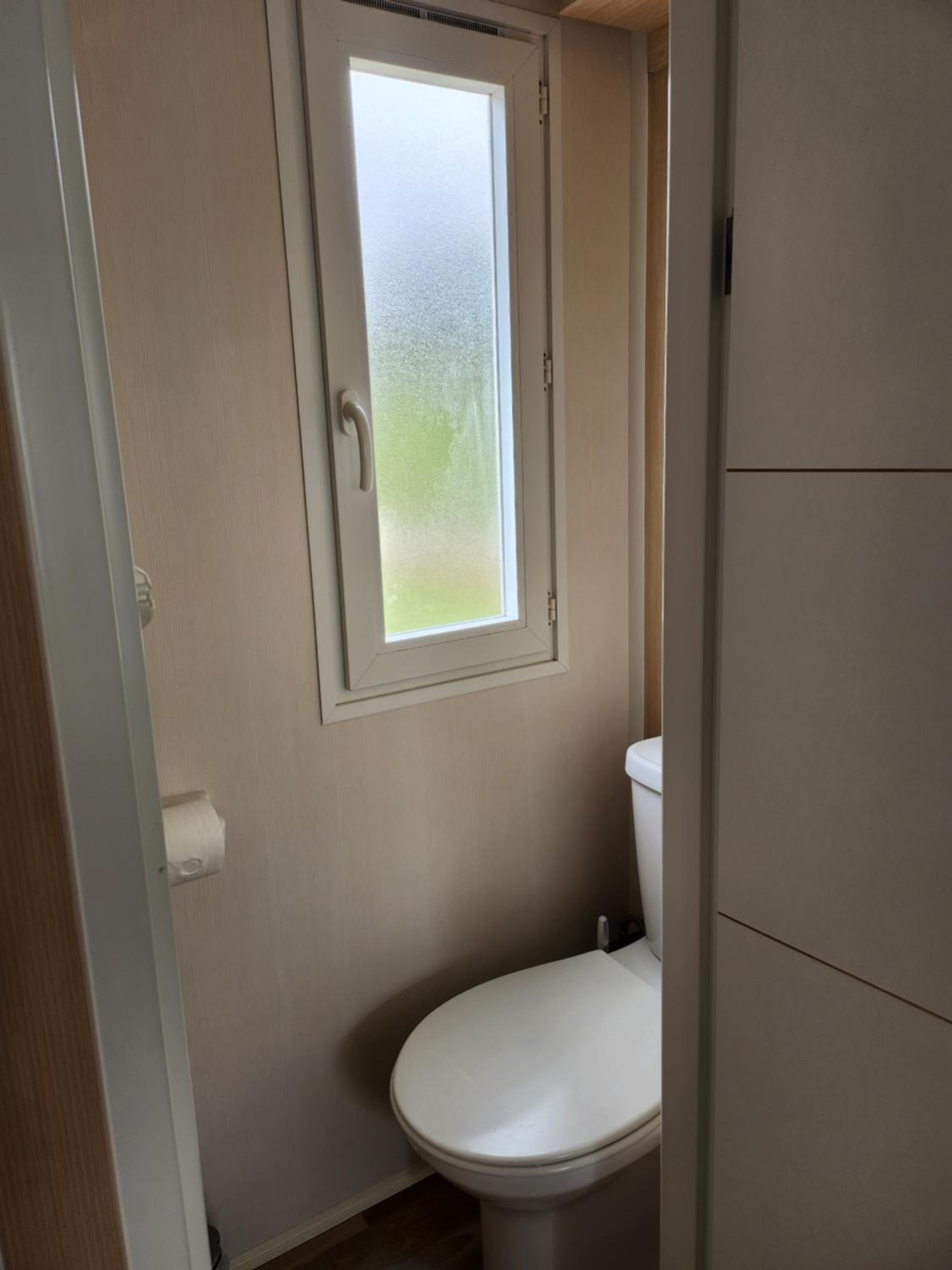 Three-Bedroom Apartment - Photo 11