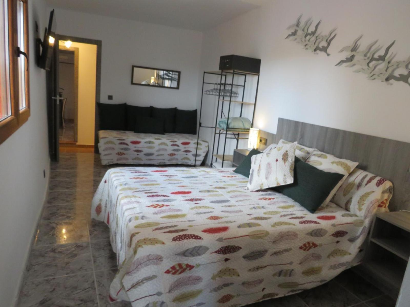 Habitación Triple con Baño Privado