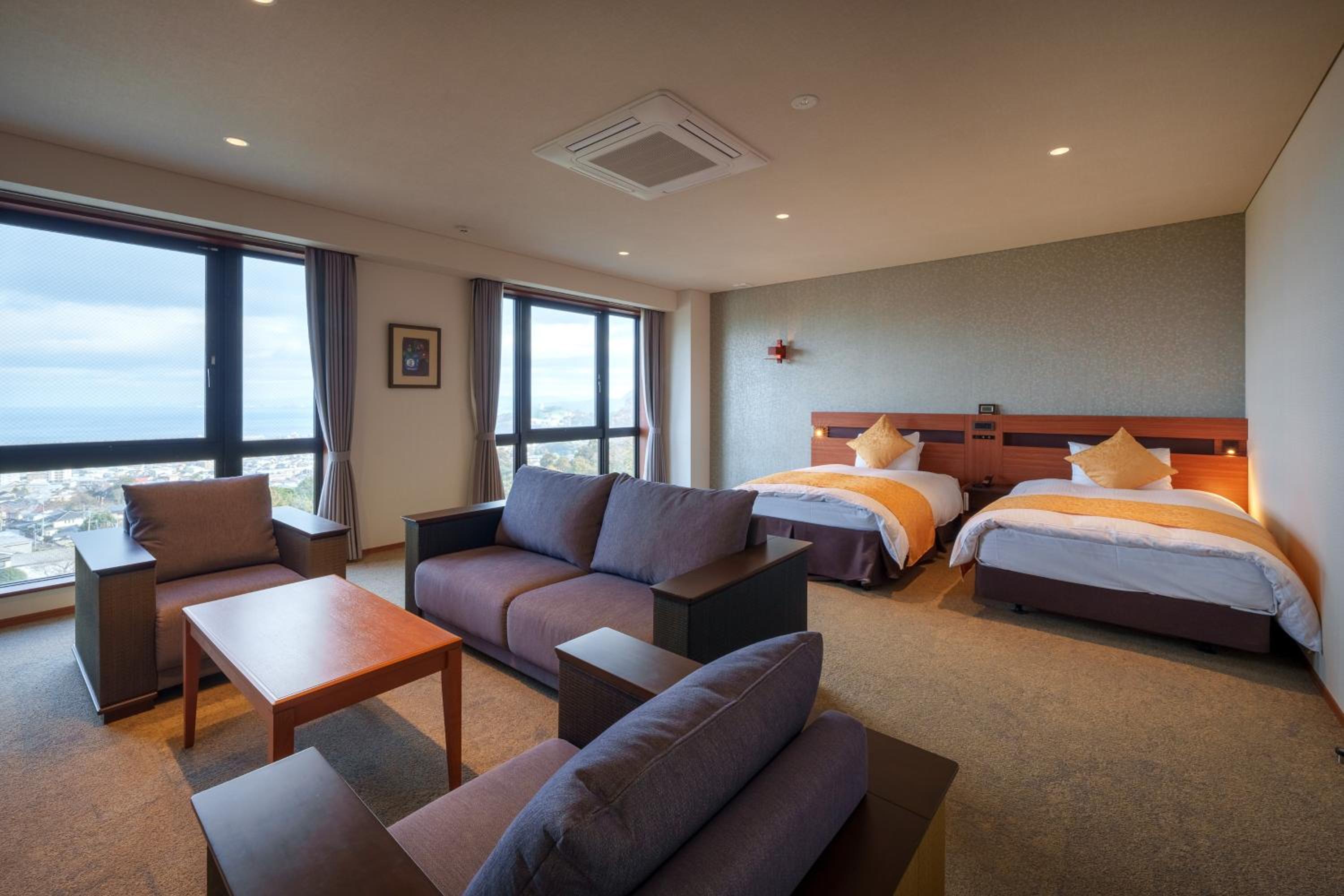 Deluxe Quadruple Room - Photo 2