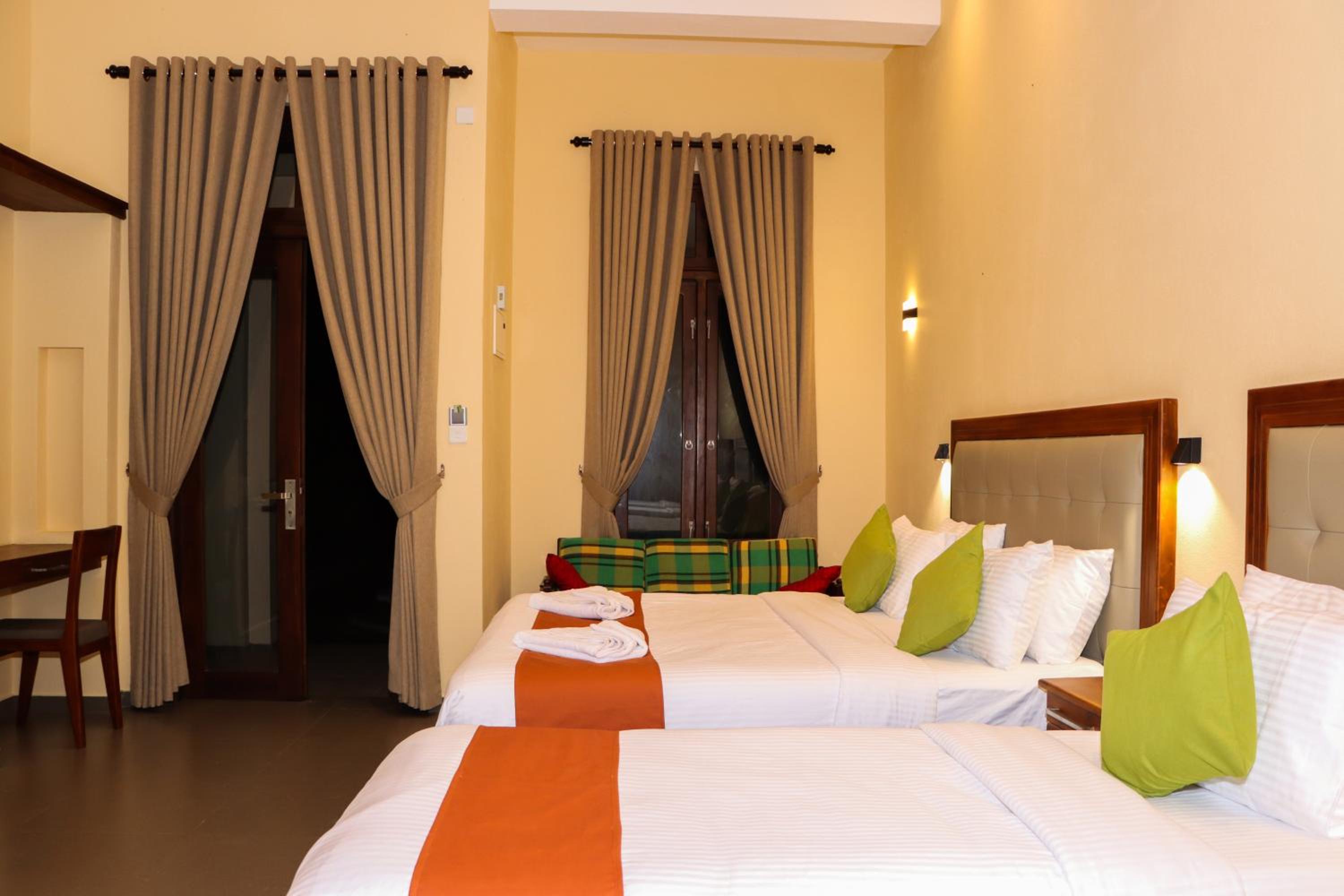 Deluxe Family Suite - Photo 5