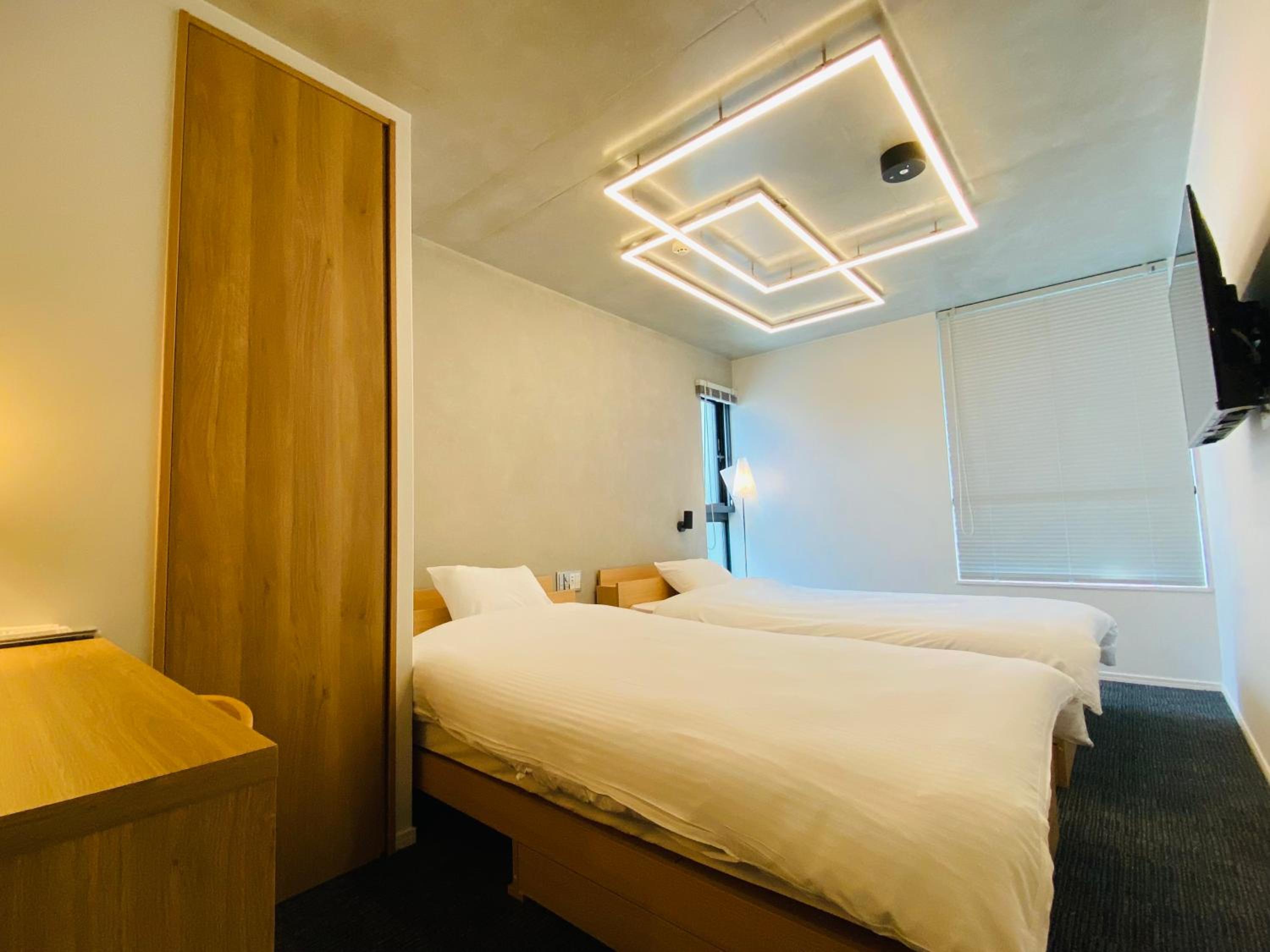 Standard Twin Room - Photo 6