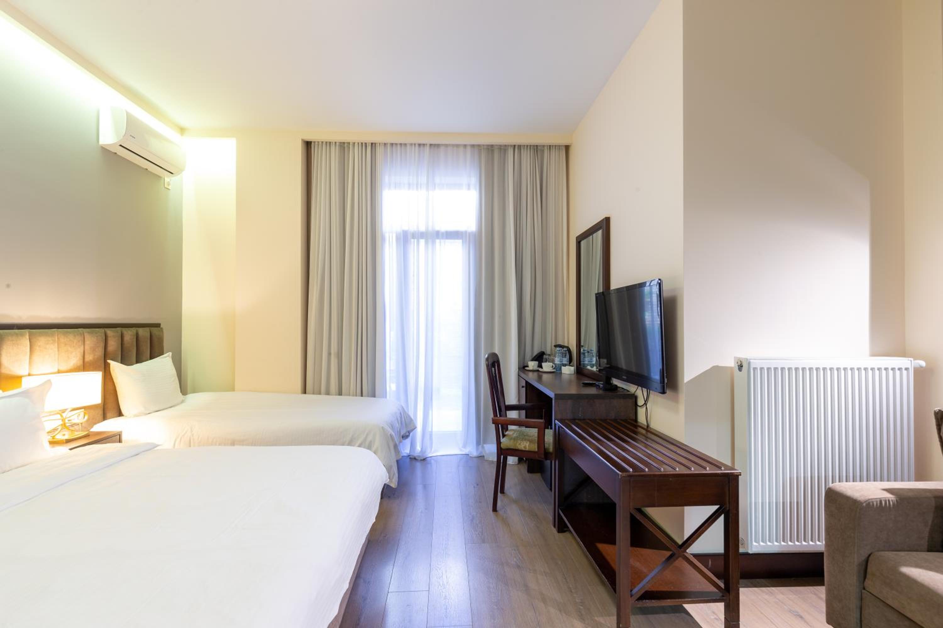 Quadruple Room with Balcony