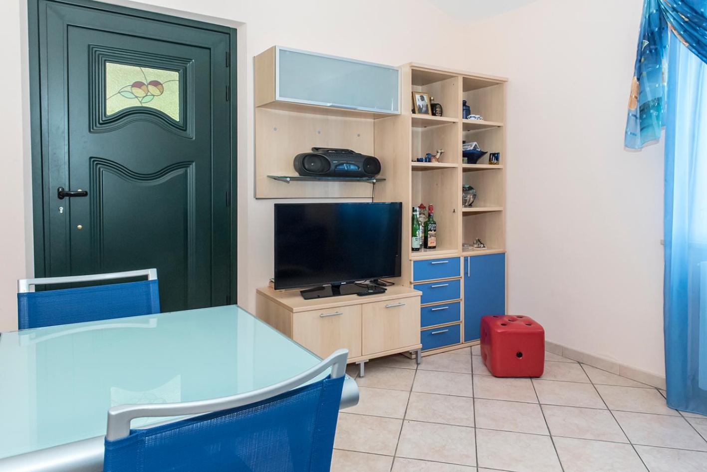Three-Bedroom Apartment photo 1