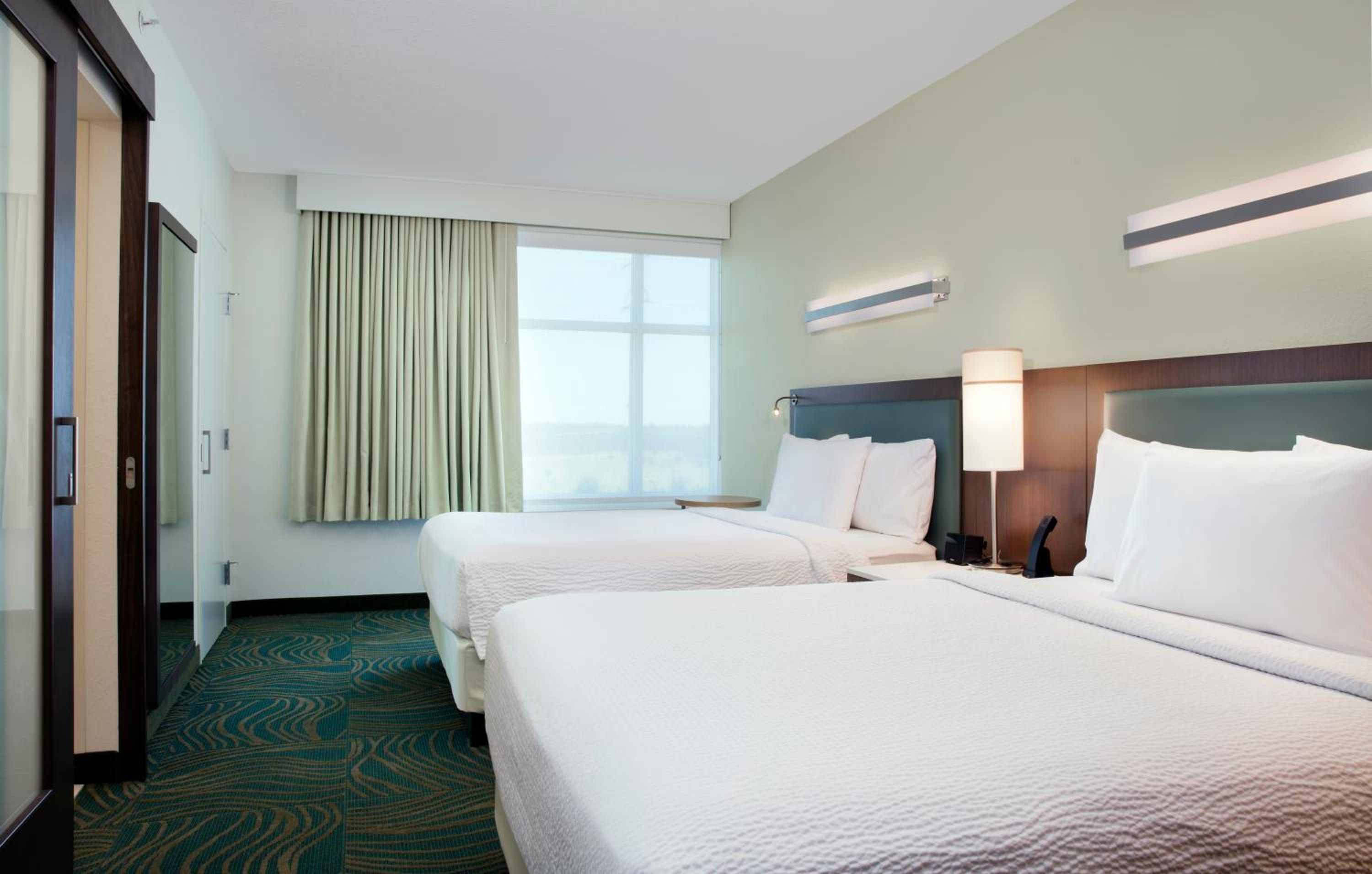 Queen Suite with Two Queen Beds and Sofa Bed